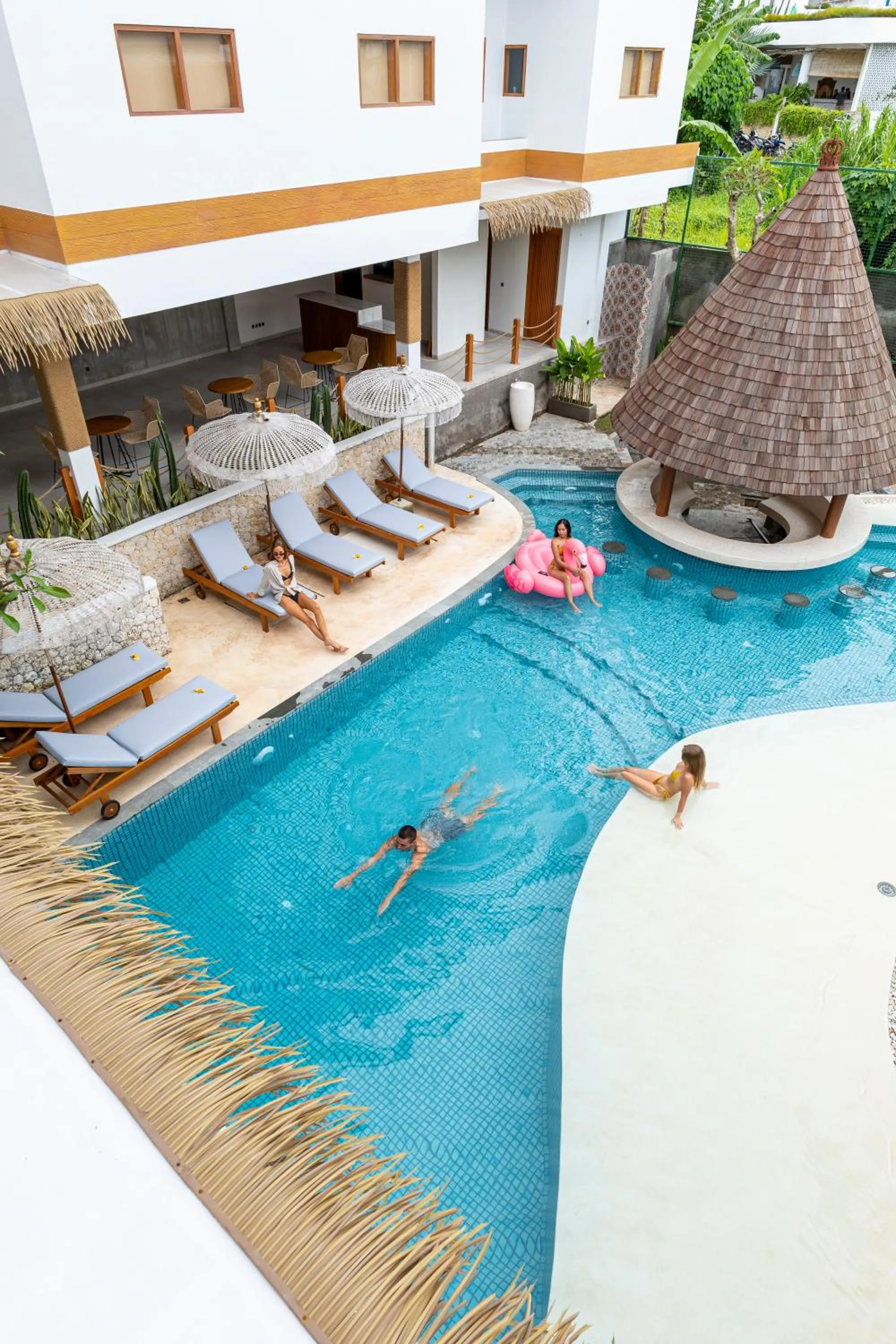 Swimming pool in Roomates Hostel Canggu by Ini Vie Hospitality