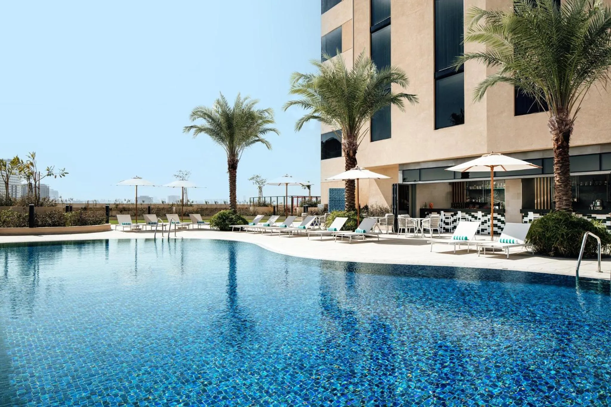 Swimming pool in Holiday Inn & Suites - Dubai Science Park by IHG