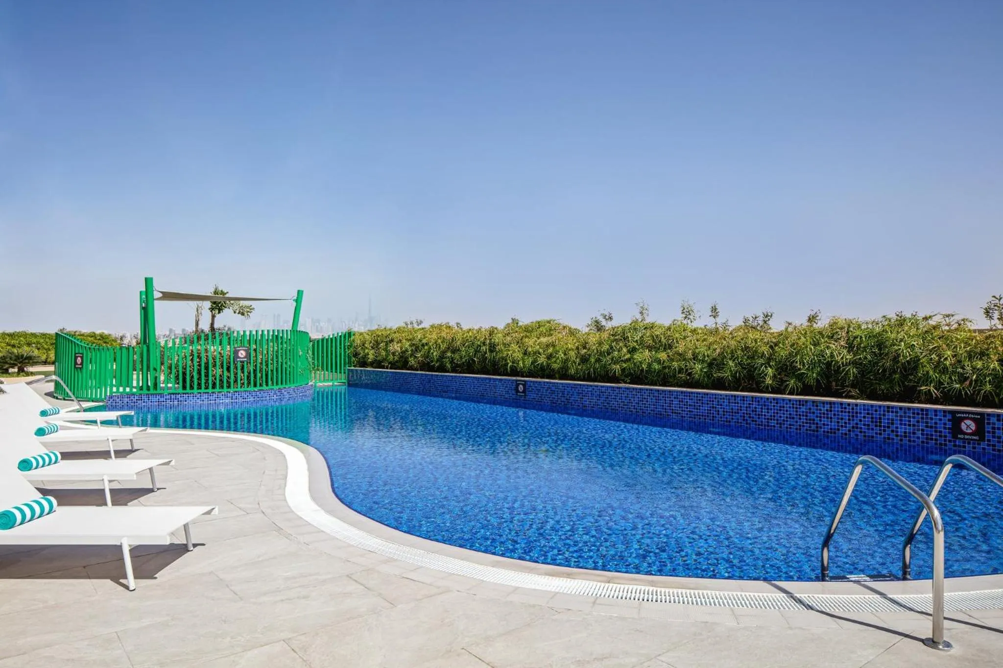 Swimming pool in Holiday Inn & Suites - Dubai Science Park by IHG
