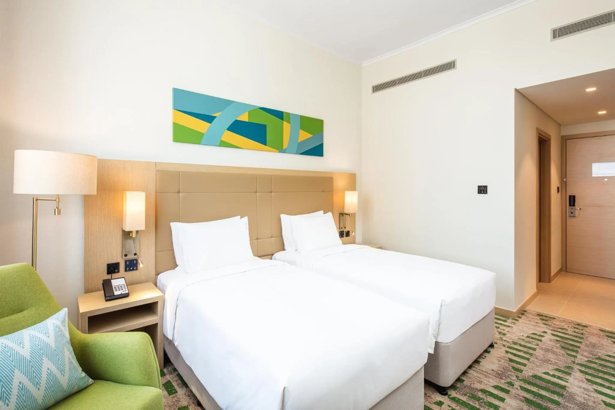 Photo of the whole room, Bed in Holiday Inn & Suites - Dubai Science Park by IHG