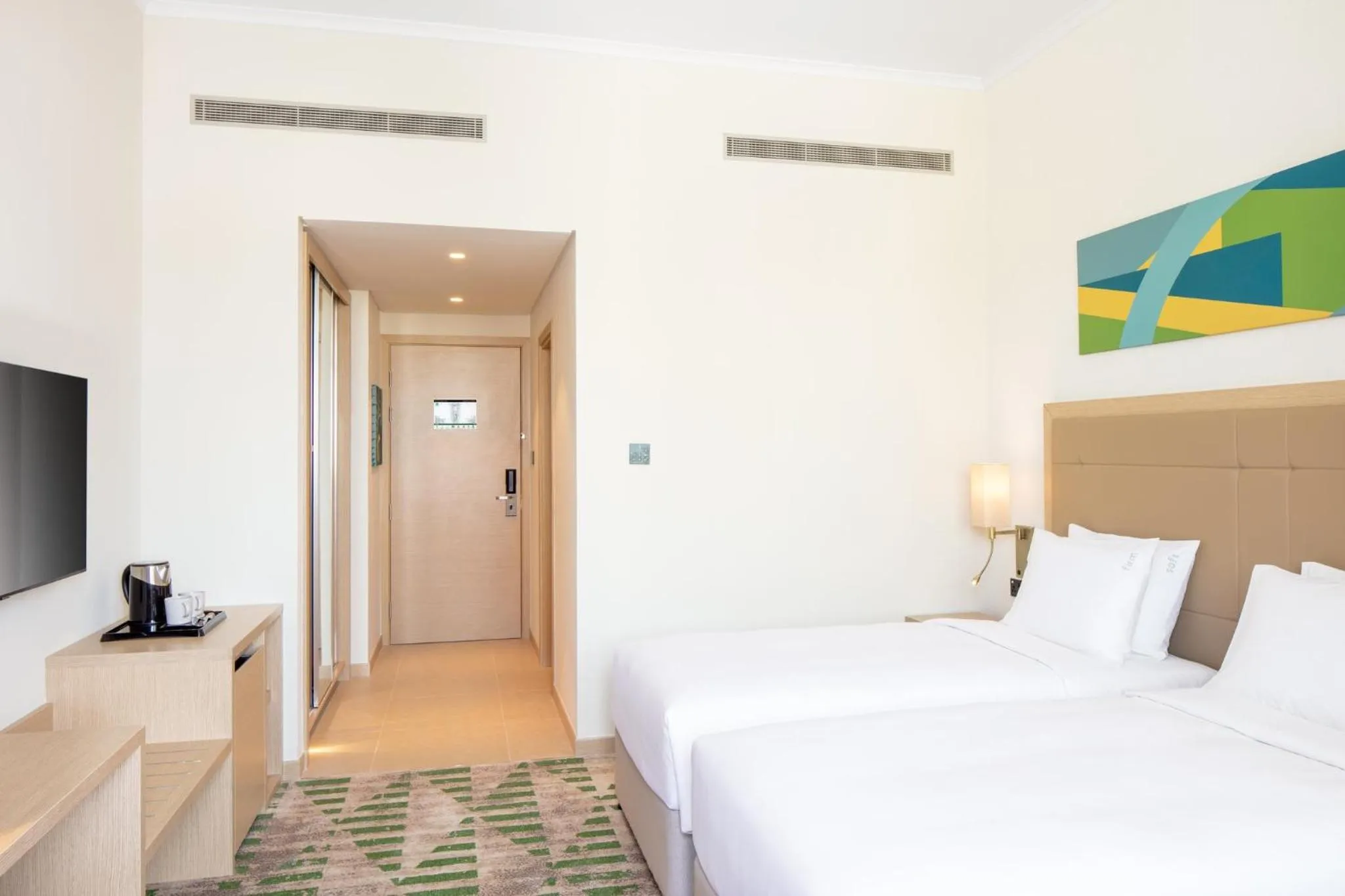Photo of the whole room, Bed in Holiday Inn & Suites - Dubai Science Park by IHG