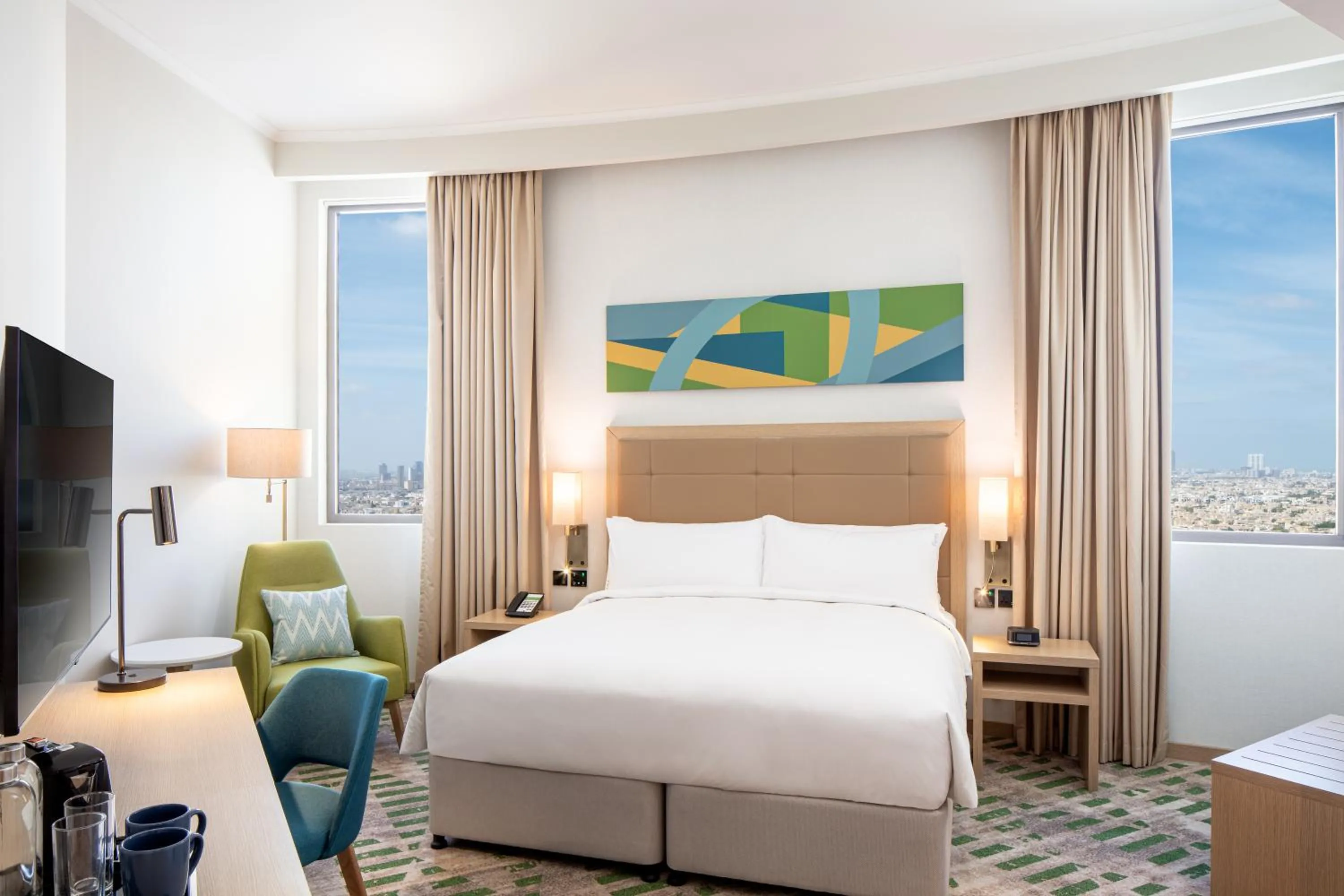 Bedroom, Bed in Holiday Inn & Suites - Dubai Science Park by IHG