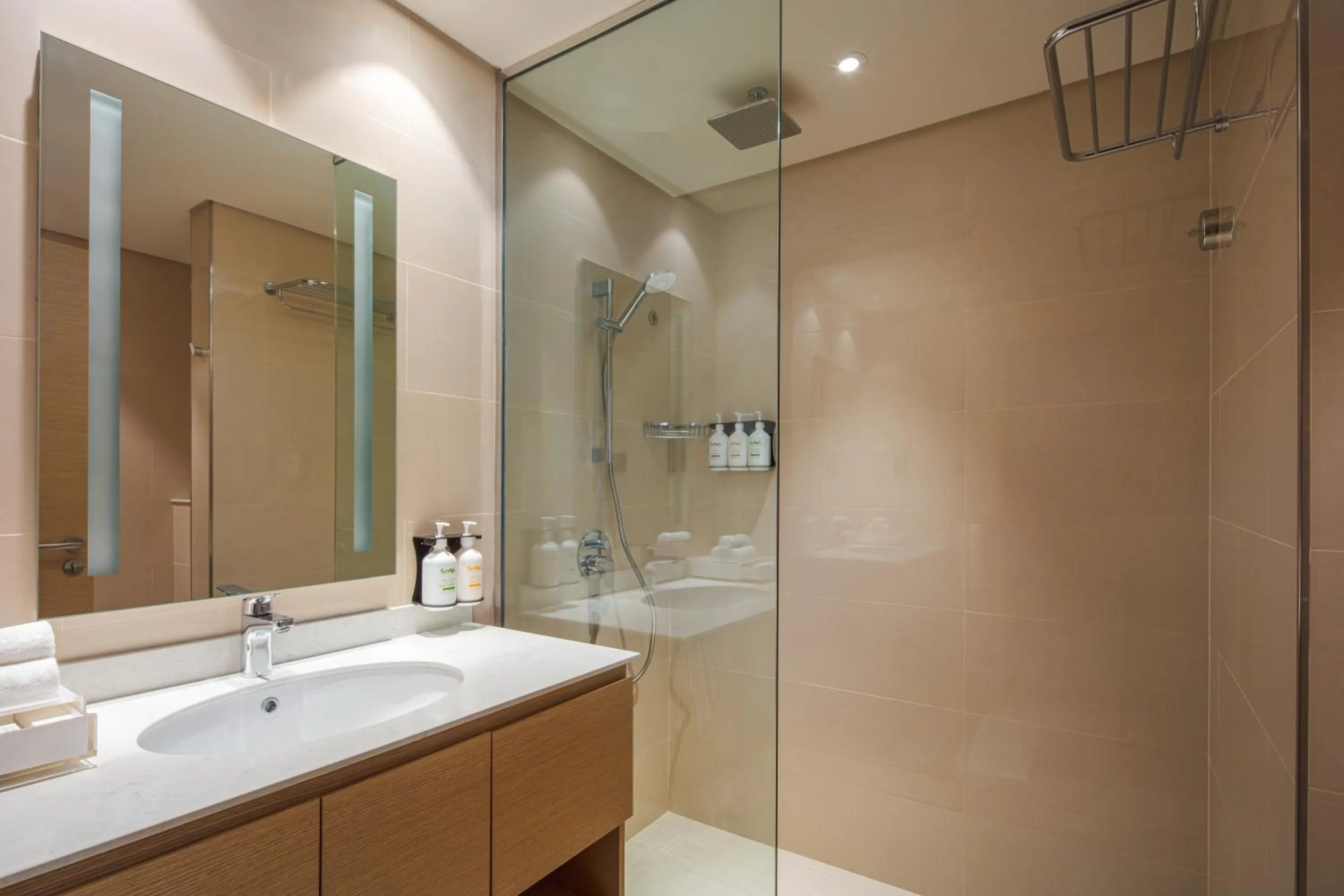 Bathroom in Holiday Inn & Suites - Dubai Science Park by IHG