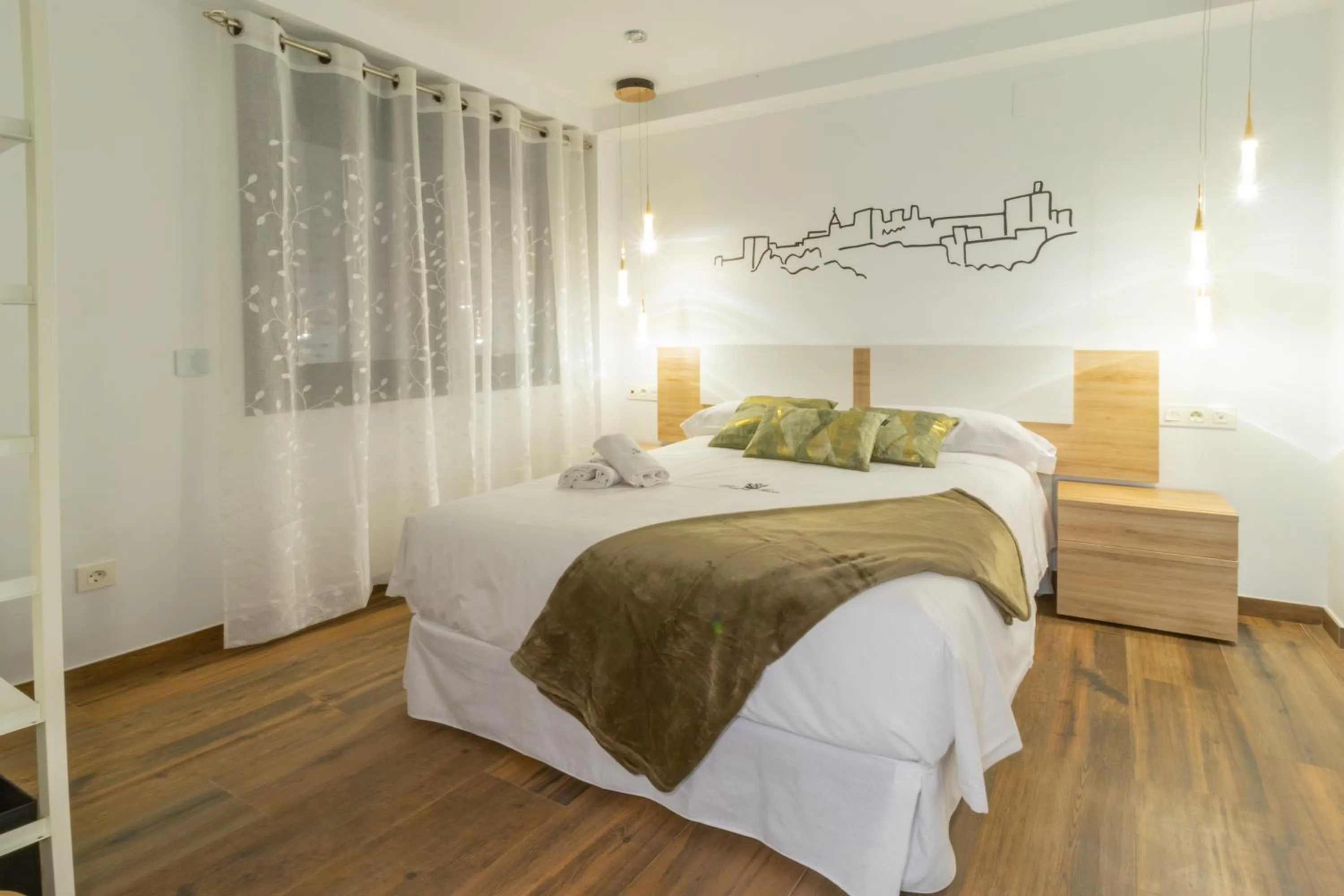 Bed in Hotel Reina Aixa