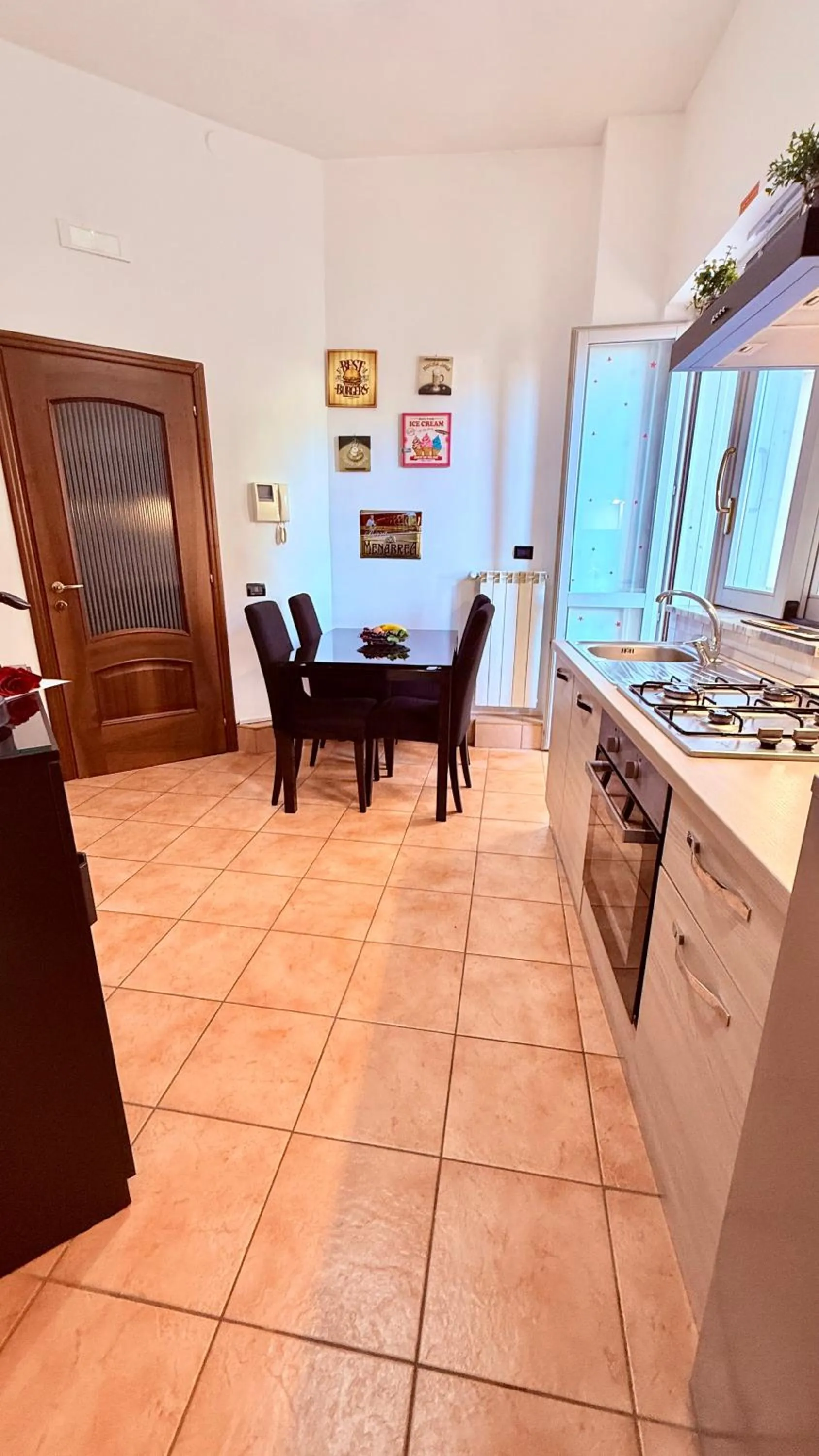 Kitchen or kitchenette in Vanvitelli Home