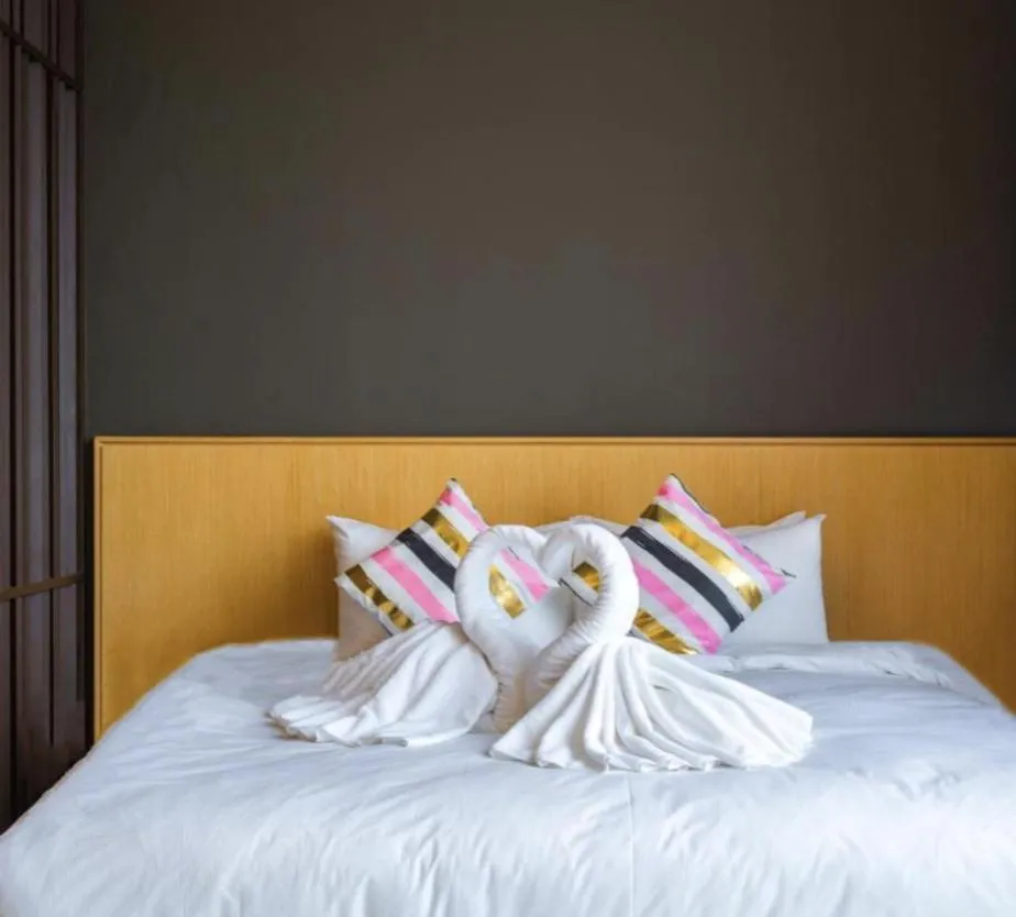 Bed in Greystone 99 Suites