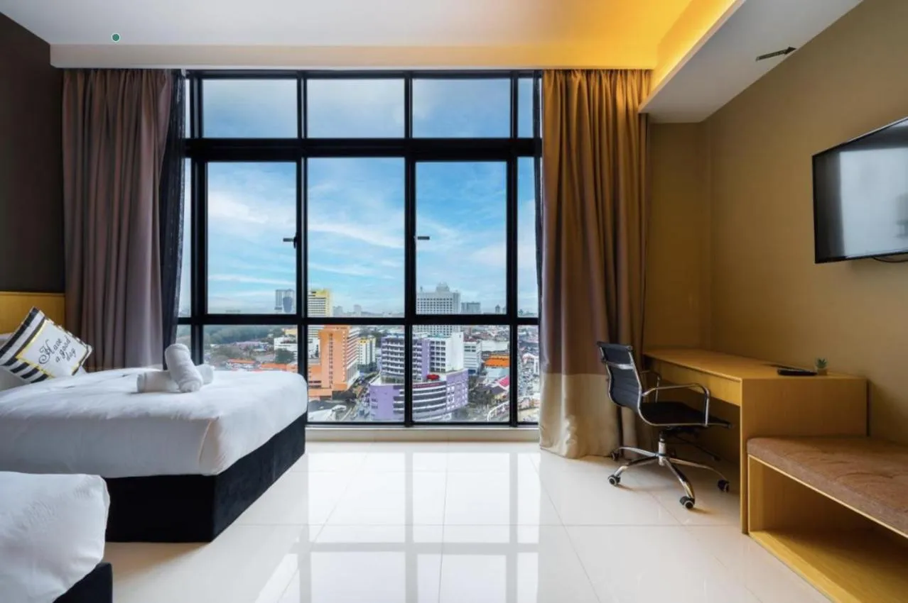 Bed in Greystone 99 Suites