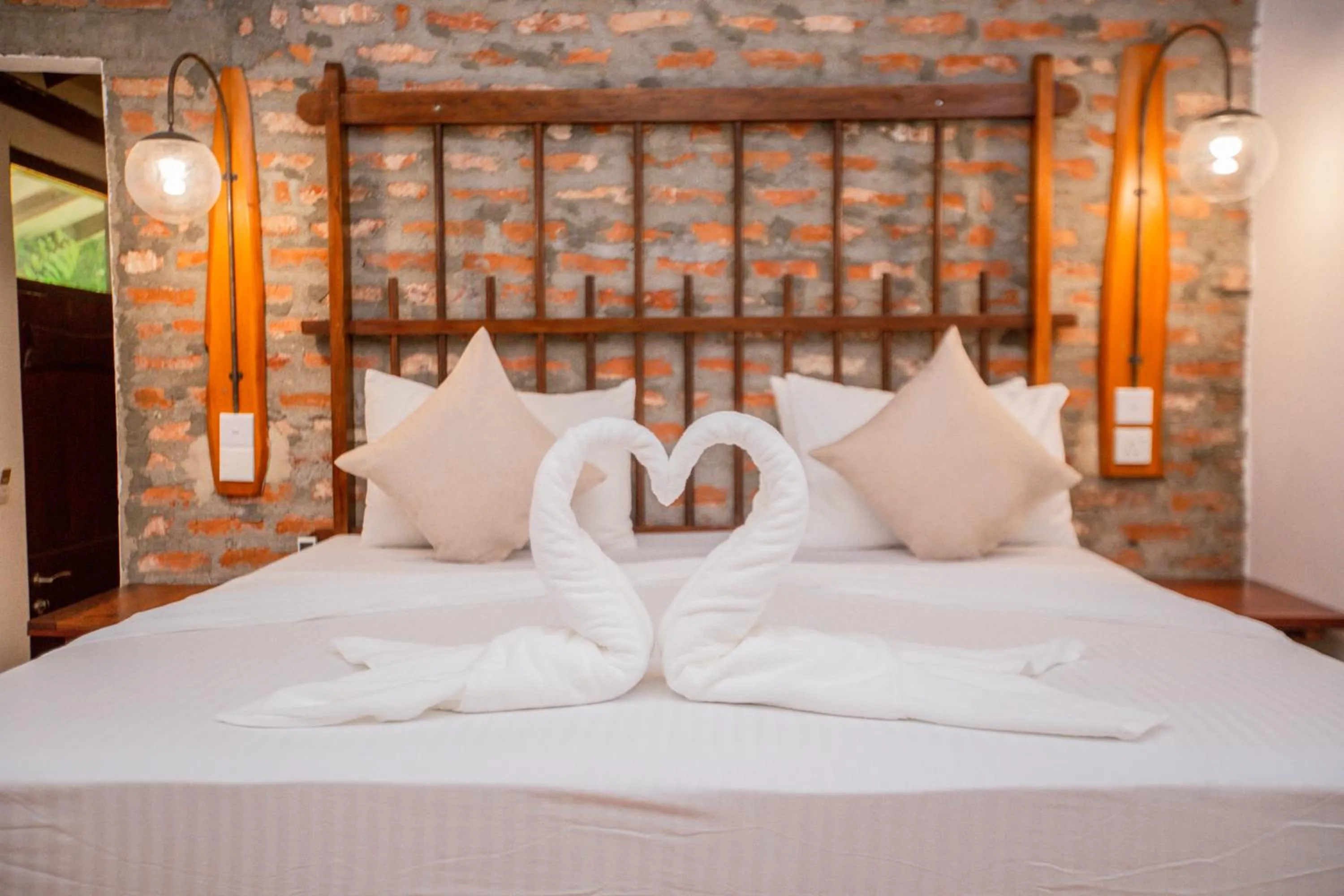 Bed in The Coastal Village Cabanas