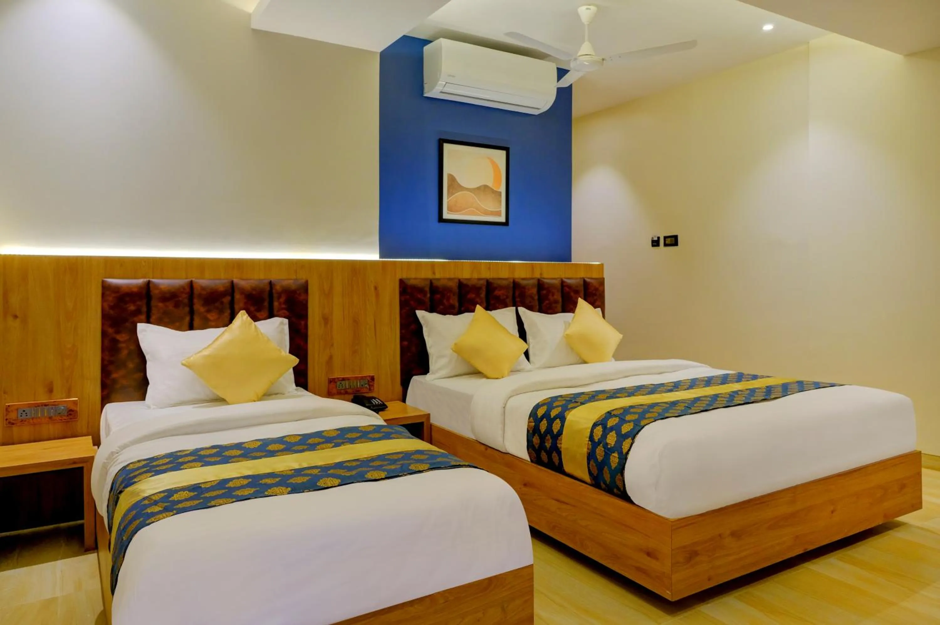 Bed in Metropolis Business Hotel