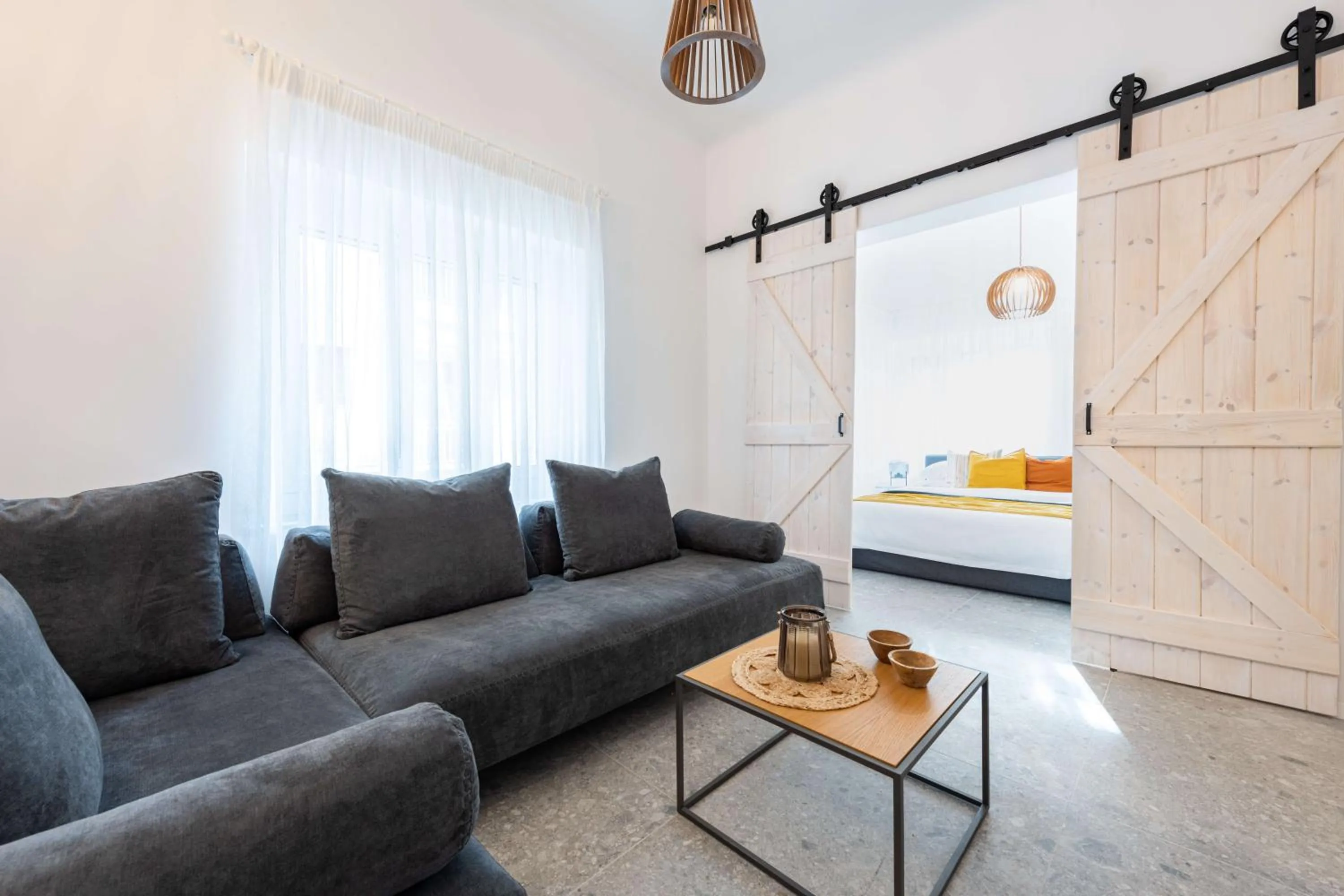 Living room, Bed in Modita Boutique Apartments