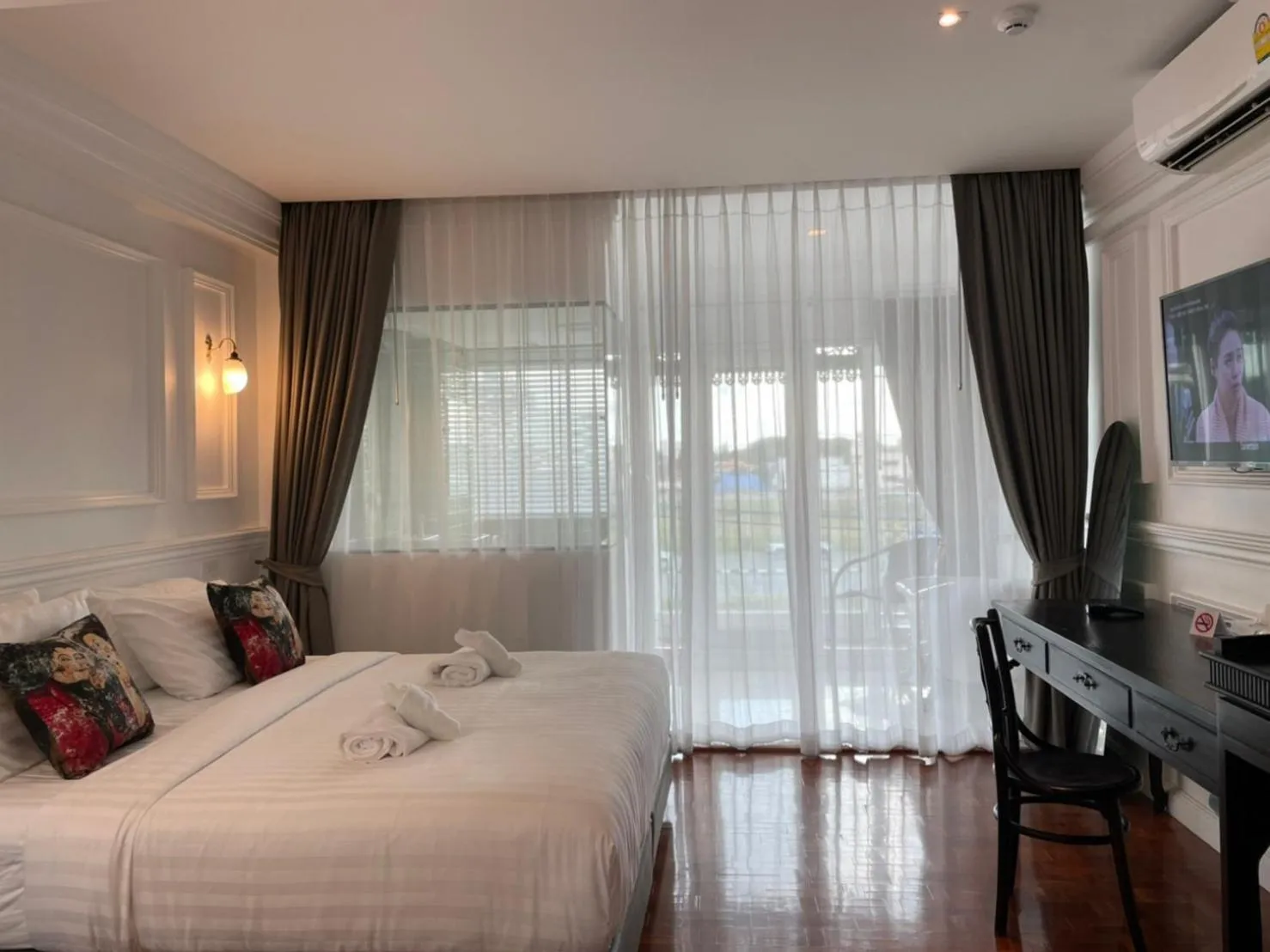 Bedroom in Wiang Ville Boutique Hotel