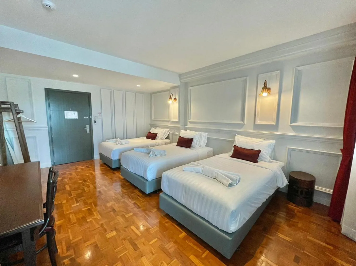 Bed in Wiang Ville Boutique Hotel