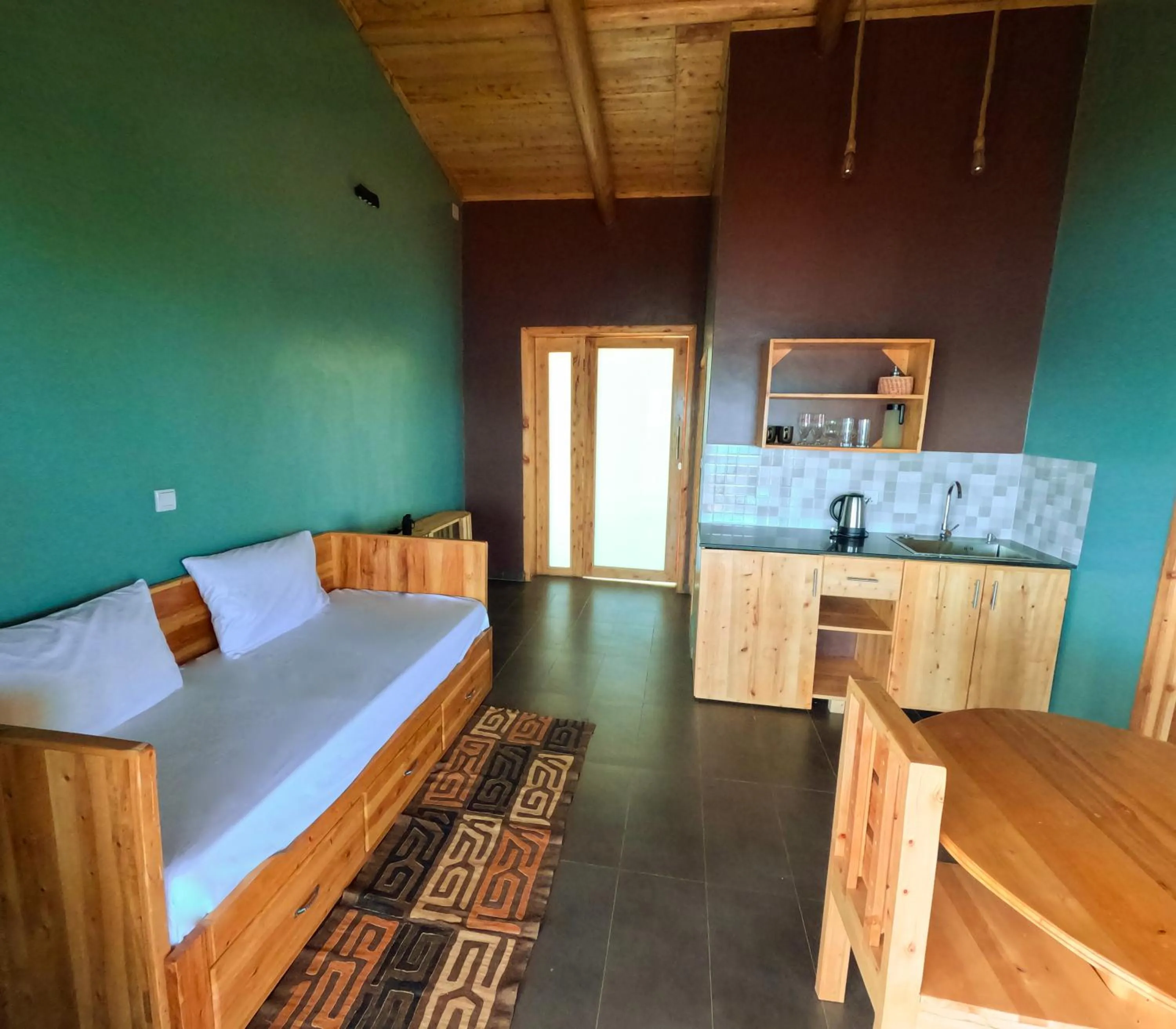 Living room, Bed in Umutuzo Lodge Kivu Lake