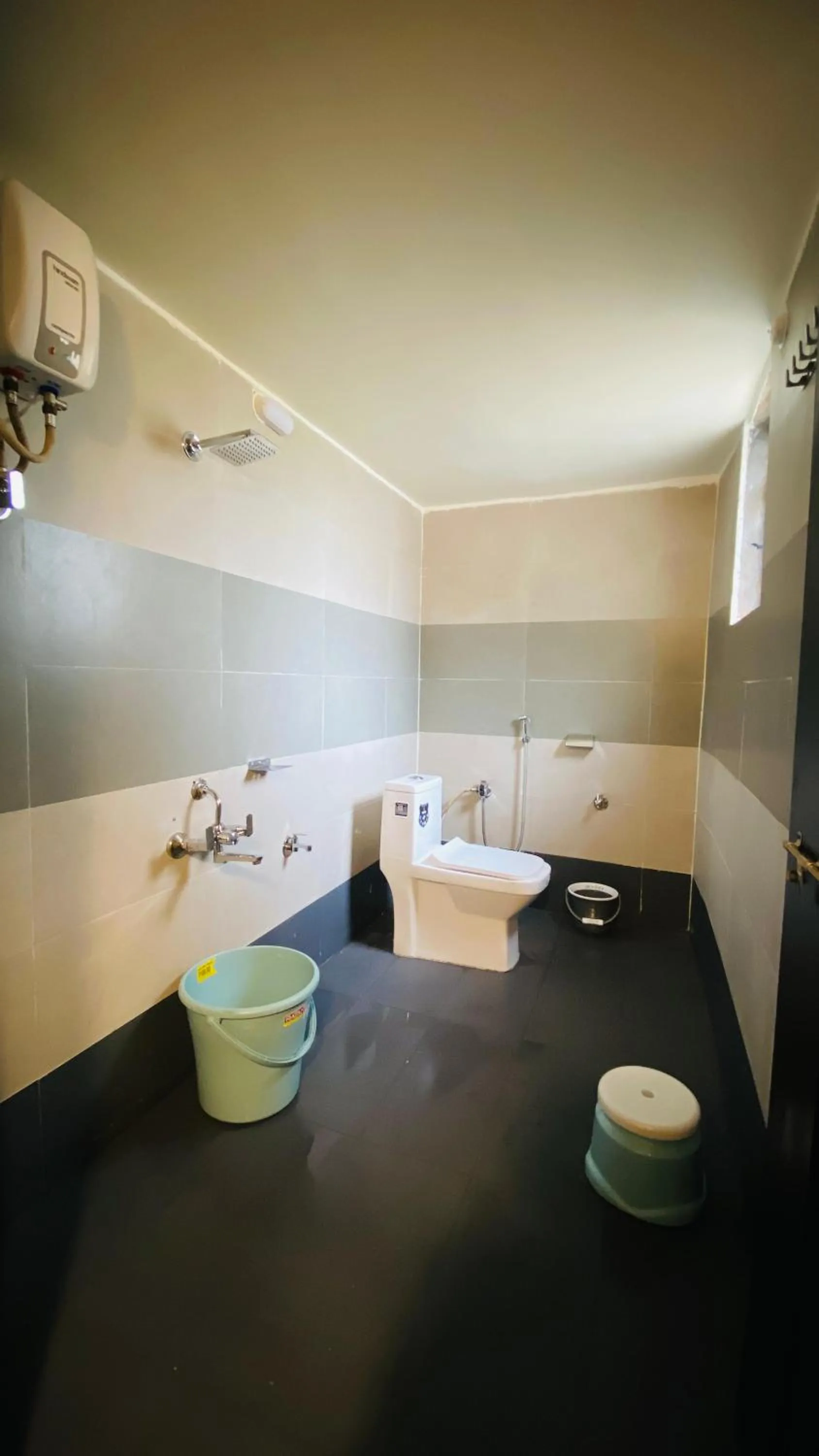 Bathroom in Ashoka Lawns and Resort