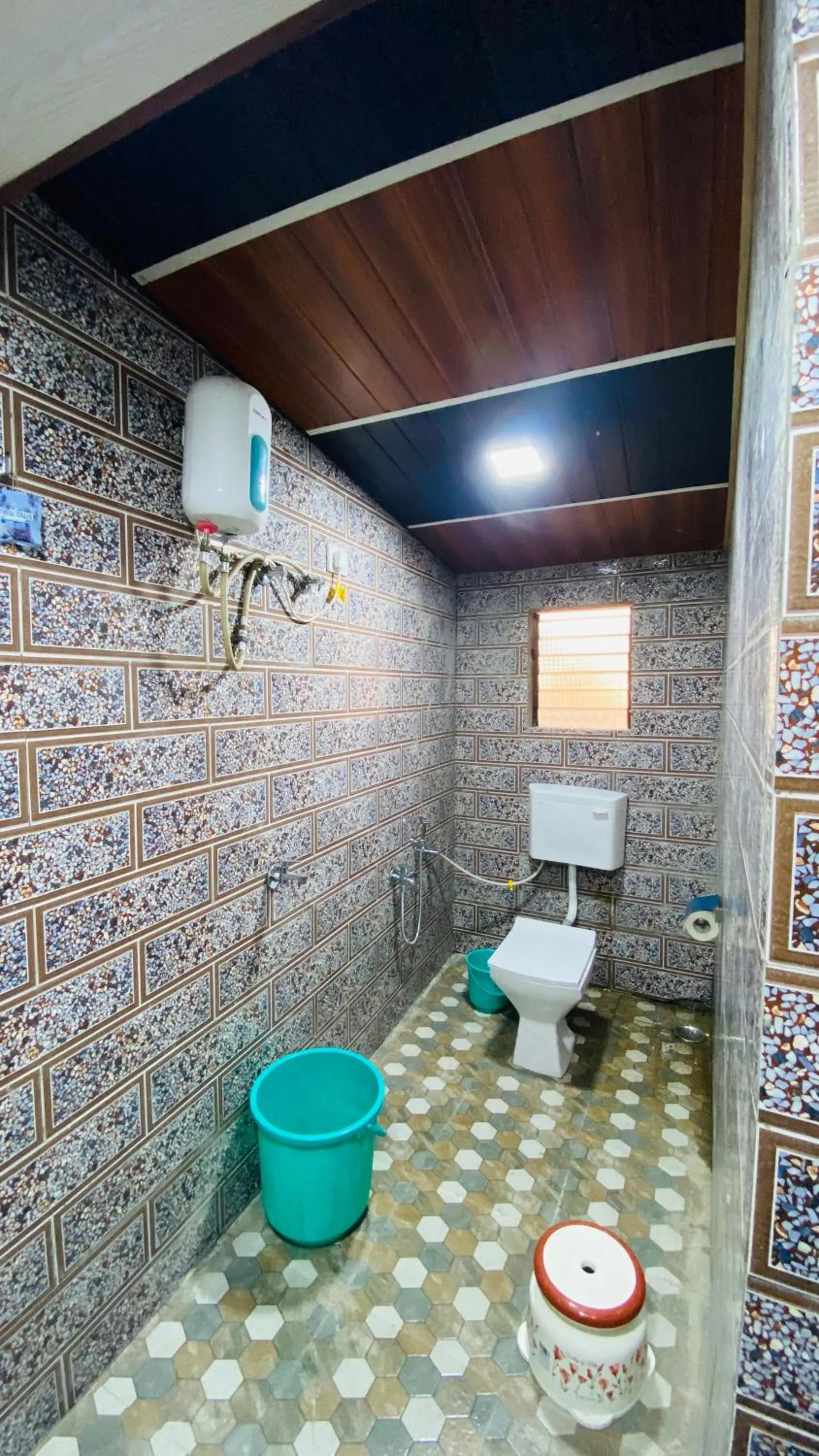 Bathroom in Ashoka Lawns and Resort
