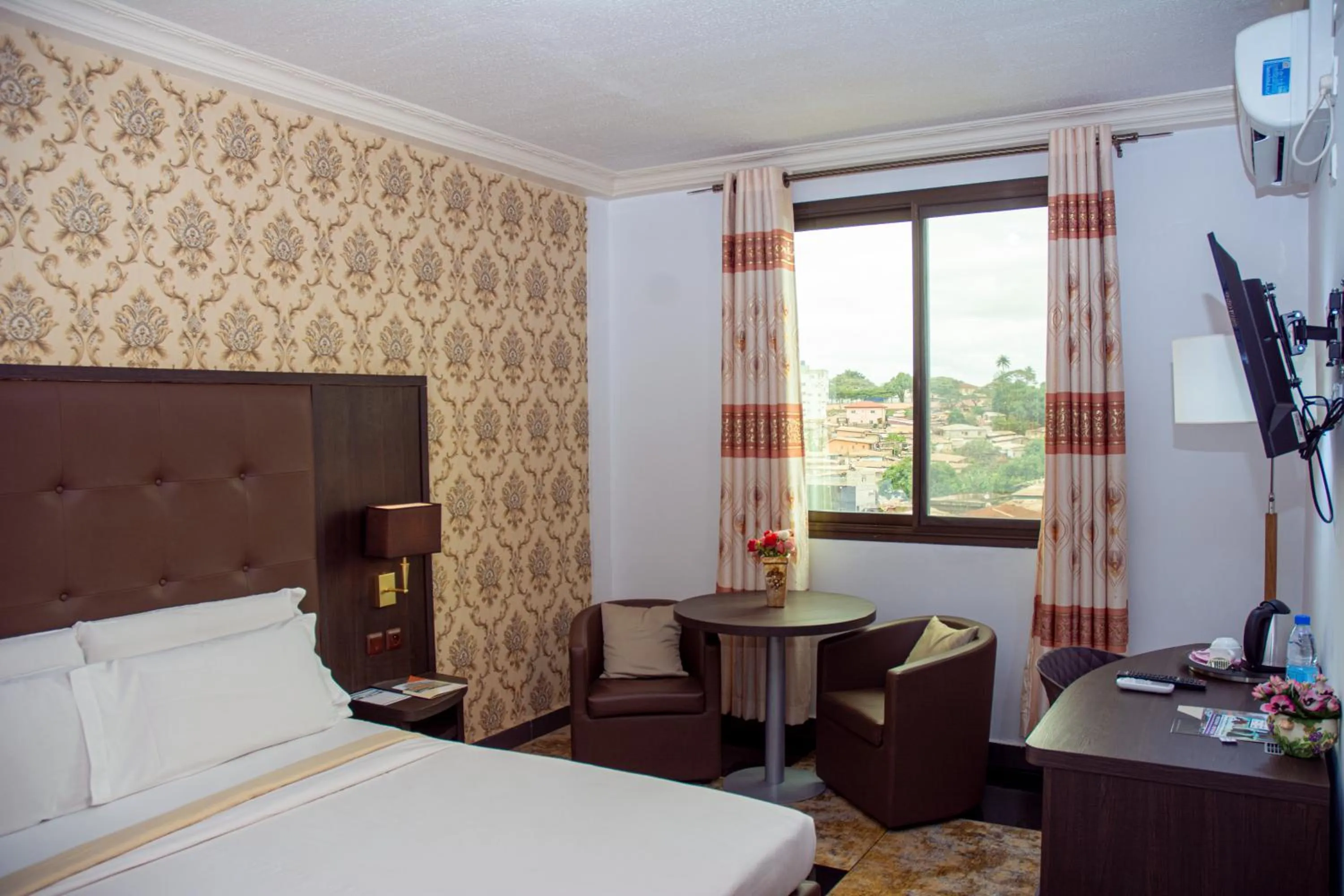 Photo of the whole room, Bed in New Heaven Hôtel