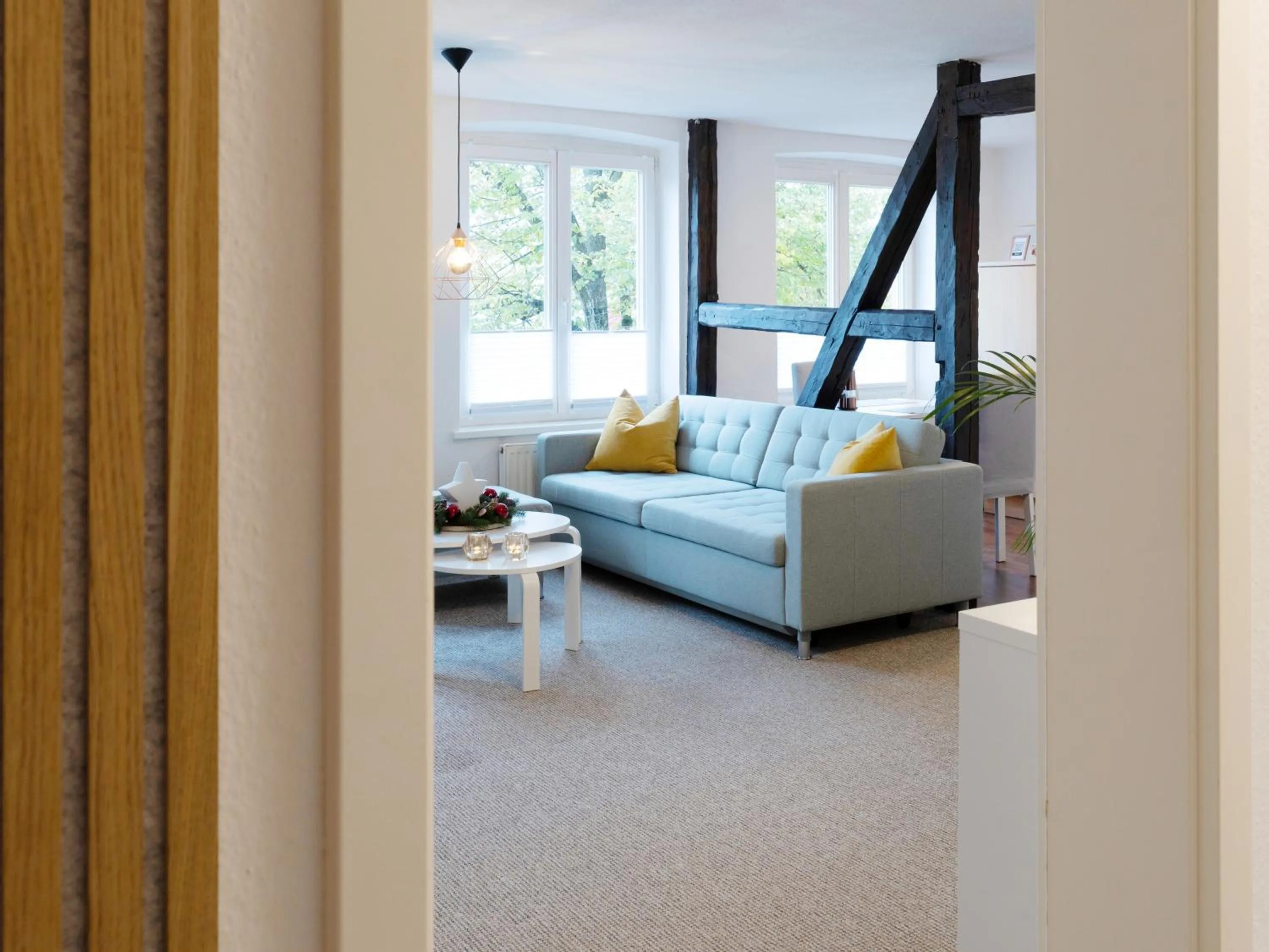 Living room in Schlosskönig - Modernes & zentrales Apartment mit Balkon und Arbeitsplatz