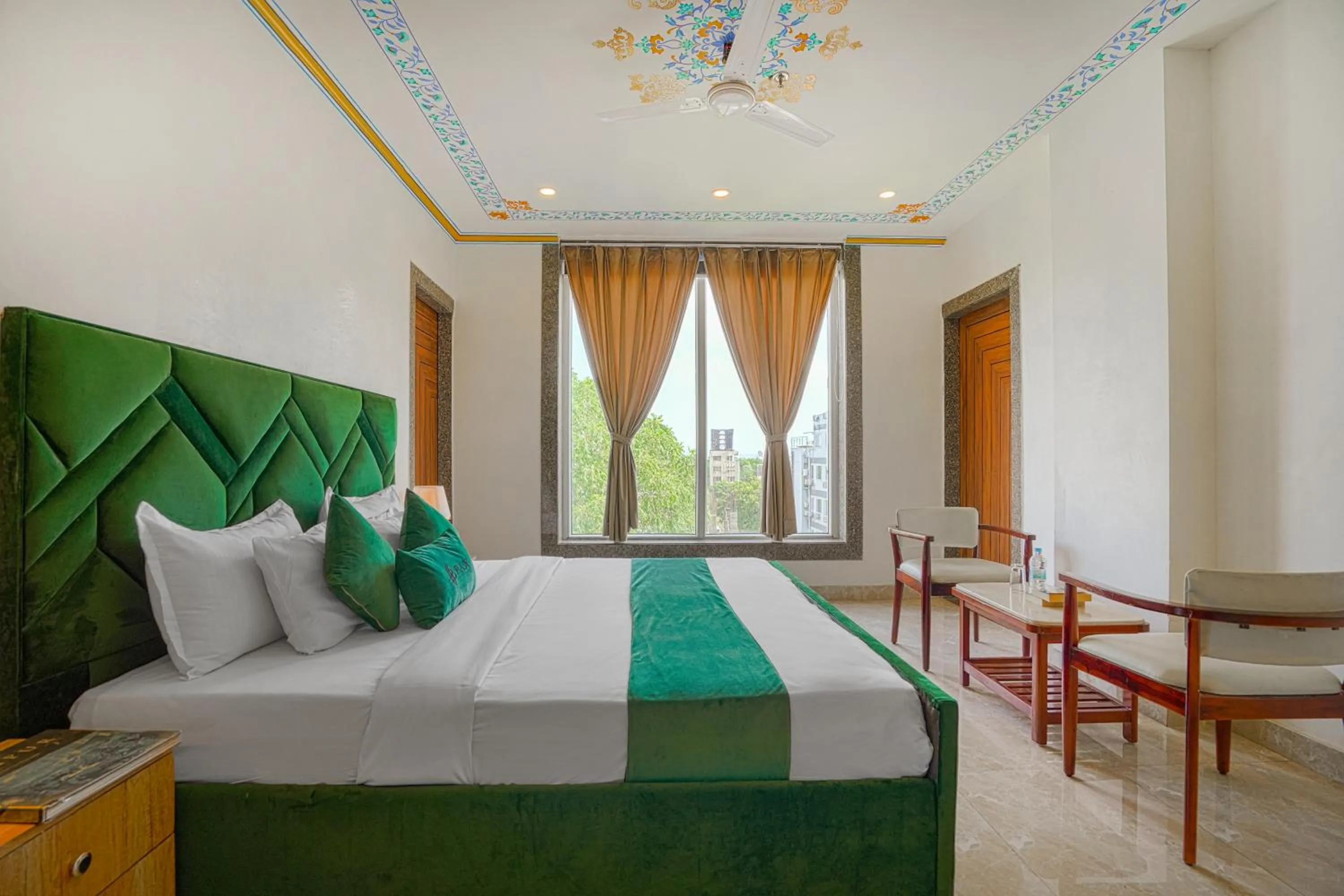 Bedroom, Bed in Pax Hotel Grand Blue 3 min walk from Udaipur city Railway Station