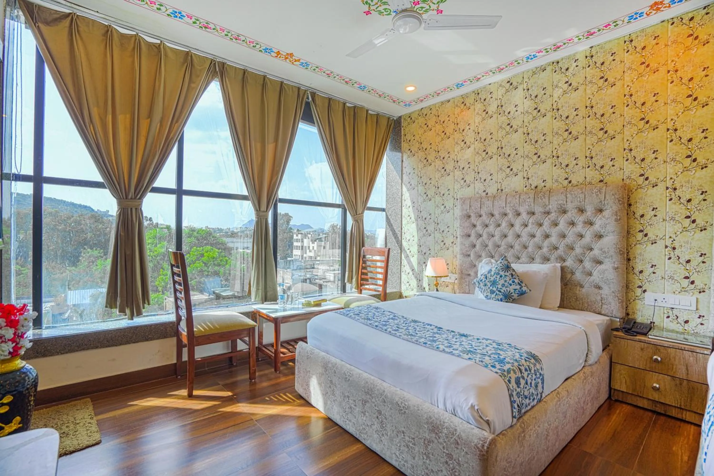 Bedroom, Bed in Pax Hotel Grand Blue 3 min walk from Udaipur city Railway Station