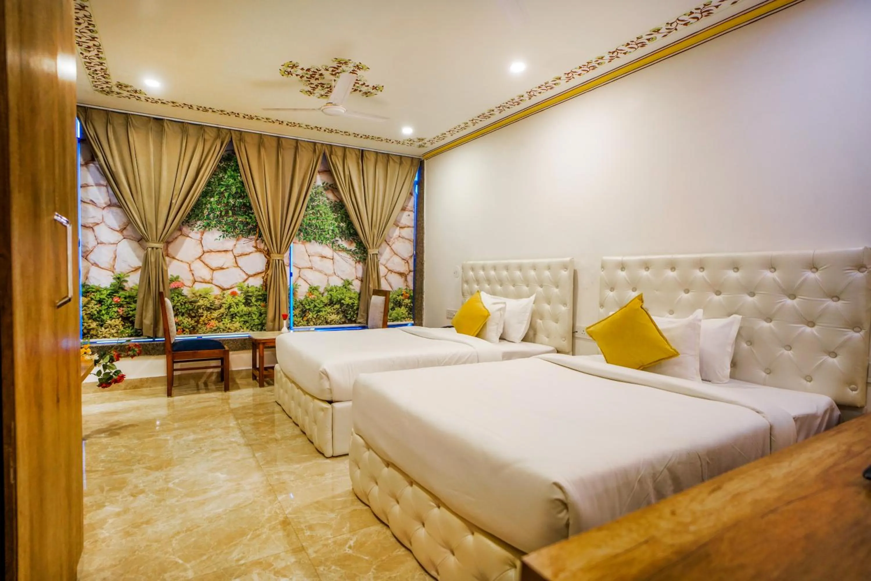 Bedroom, Bed in Pax Hotel Grand Blue 3 min walk from Udaipur city Railway Station