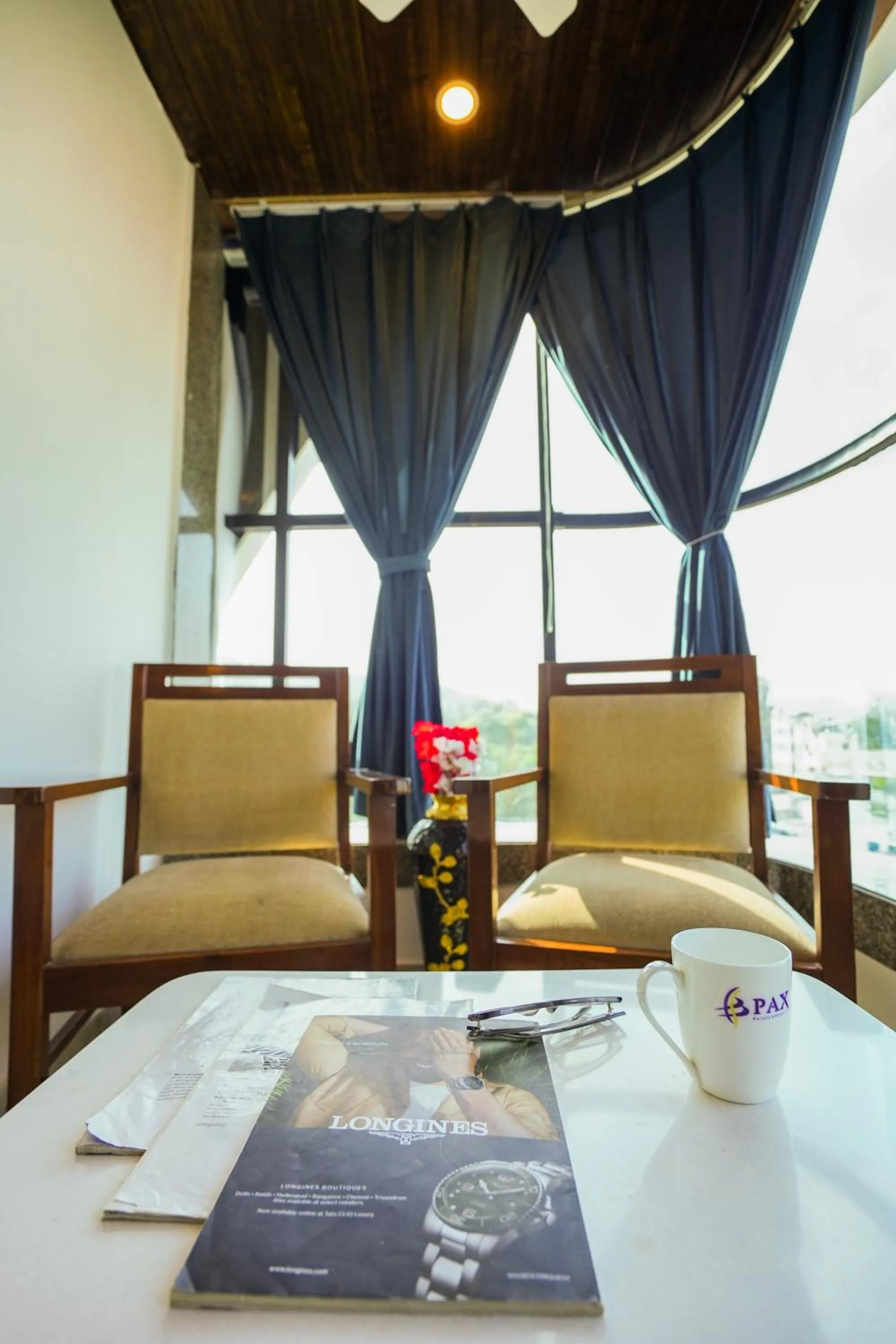 Seating area in Pax Hotel Grand Blue 3 min walk from Udaipur city Railway Station