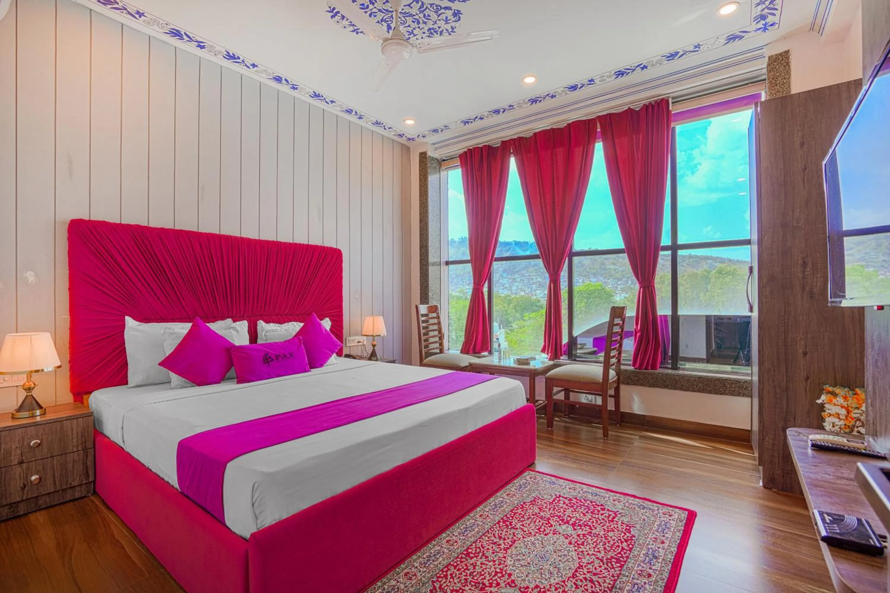 Bedroom, Bed in Pax Hotel Grand Blue 3 min walk from Udaipur city Railway Station