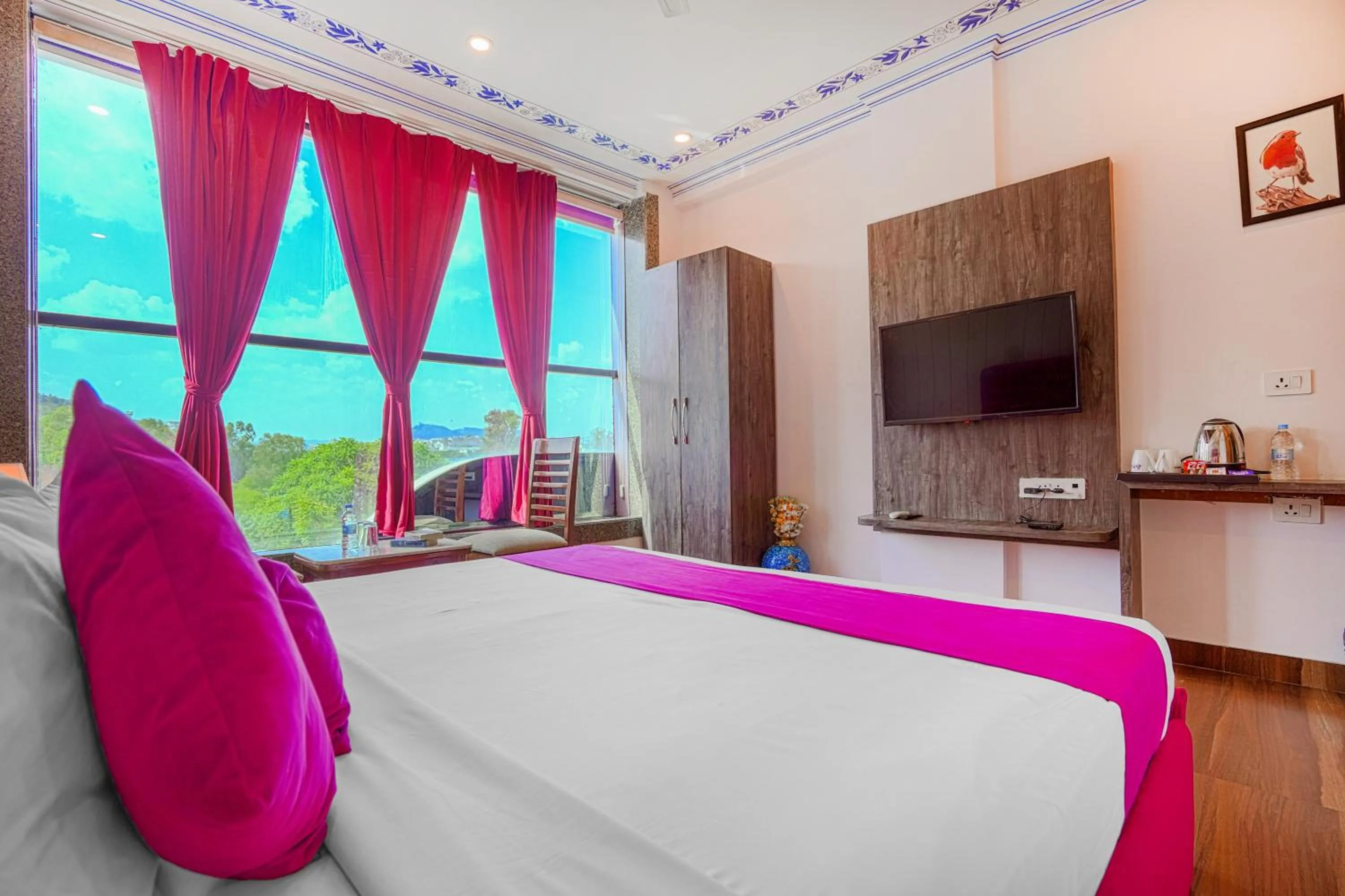 Bedroom, Bed in Pax Hotel Grand Blue 3 min walk from Udaipur city Railway Station