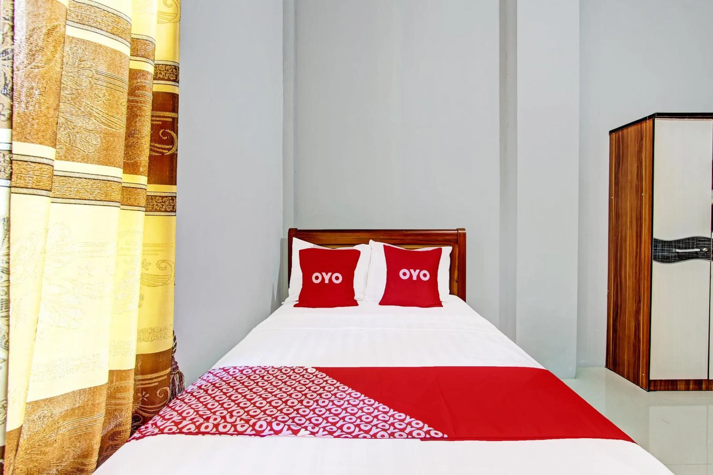 Bedroom in OYO 91960 Fariza House Syariah