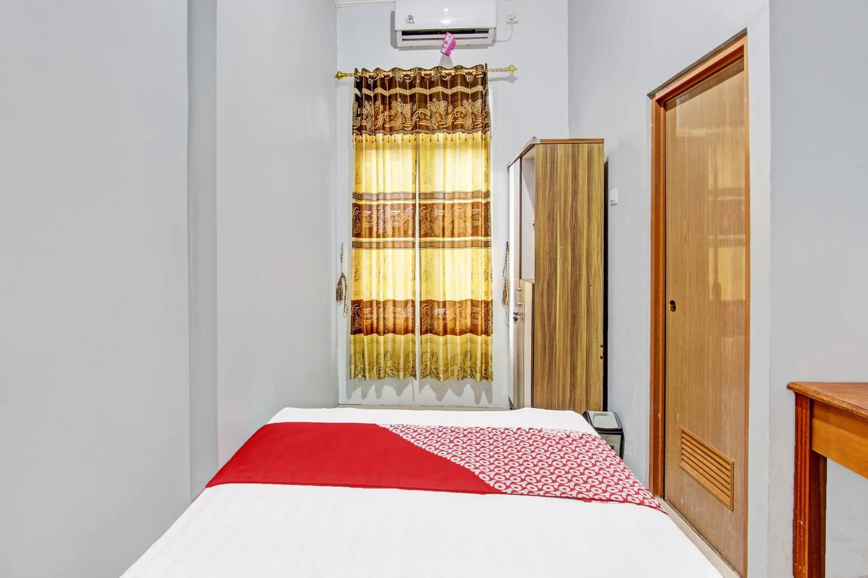 Bedroom in OYO 91960 Fariza House Syariah