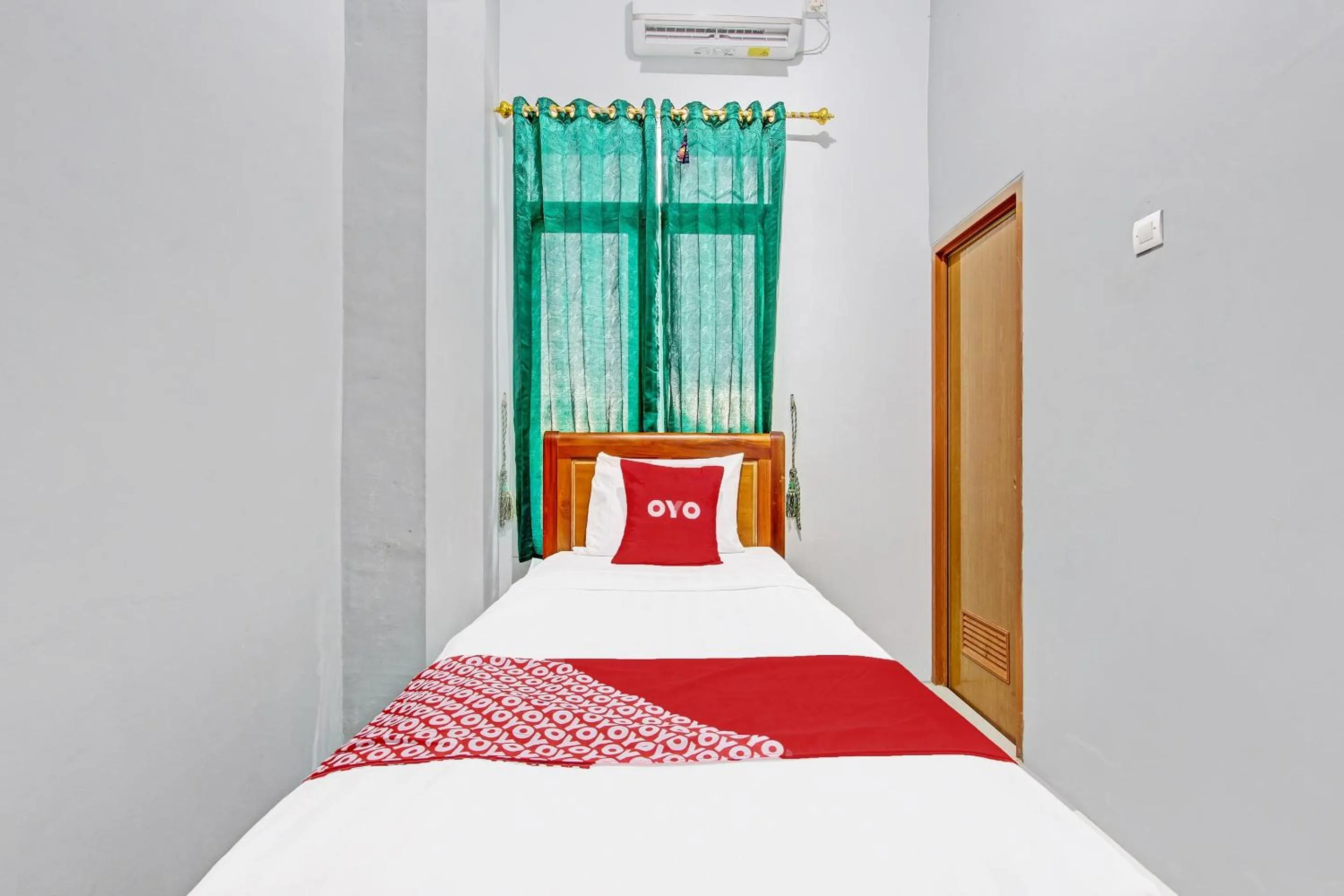 Bedroom in OYO 91960 Fariza House Syariah