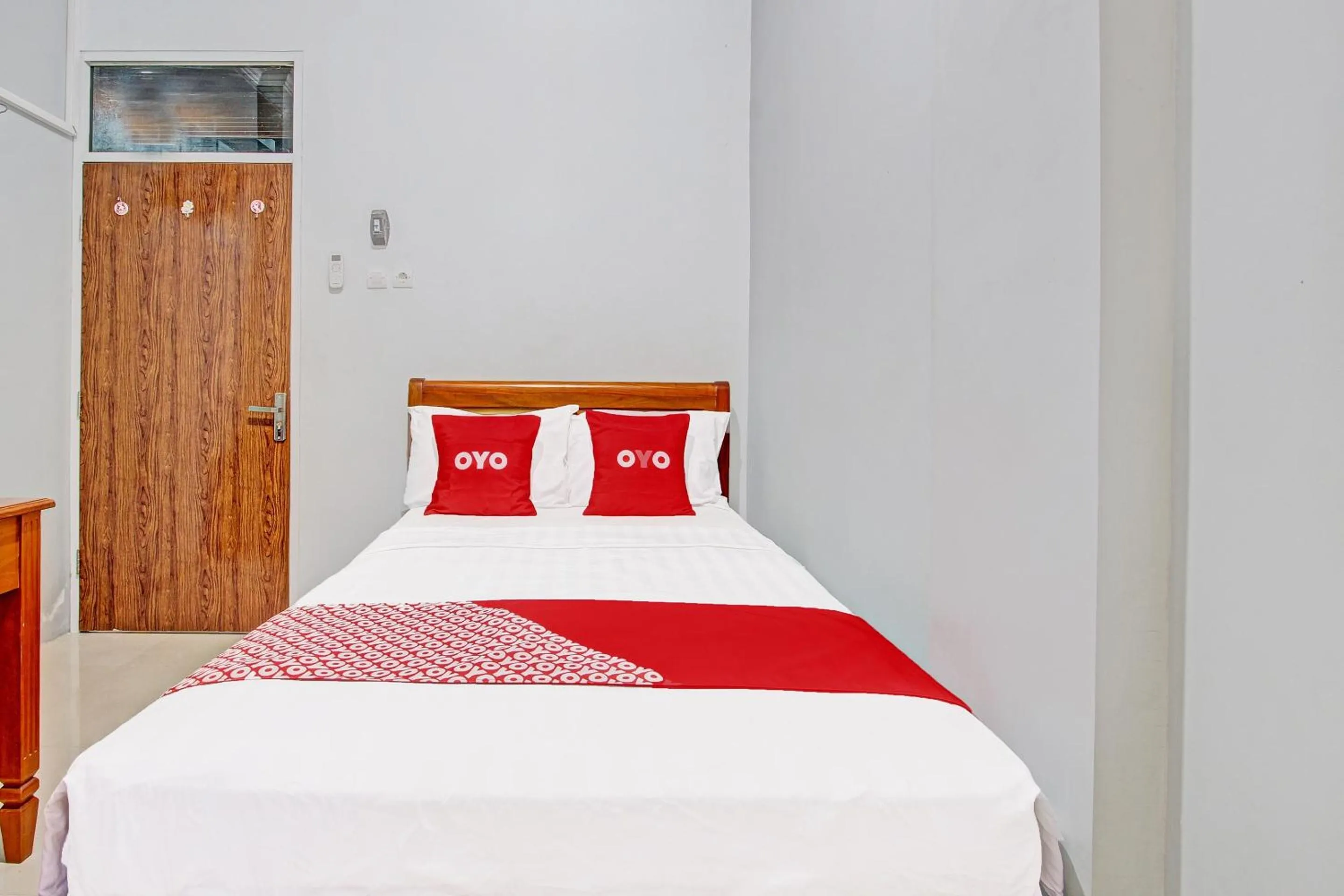 Bedroom in OYO 91960 Fariza House Syariah