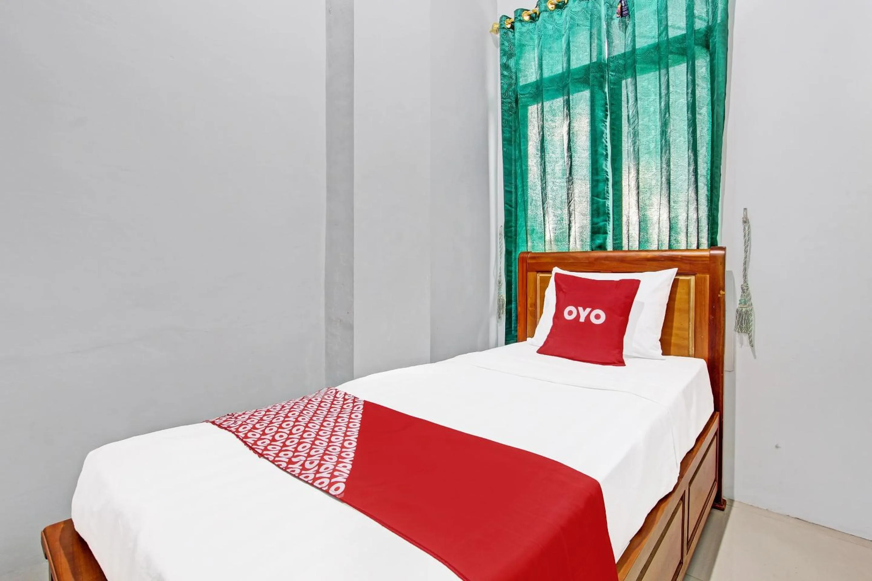 Bedroom in OYO 91960 Fariza House Syariah