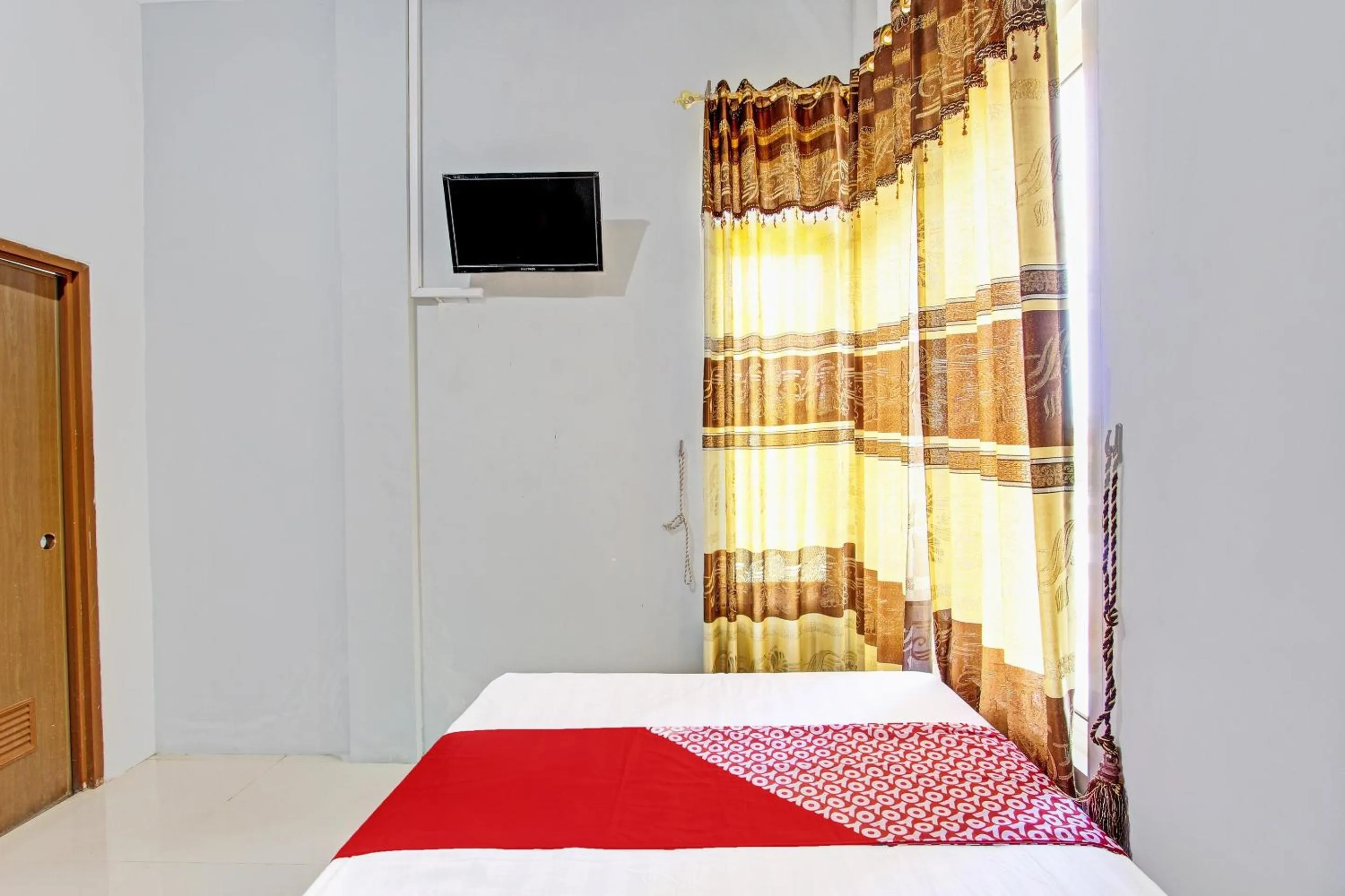 Bedroom in OYO 91960 Fariza House Syariah