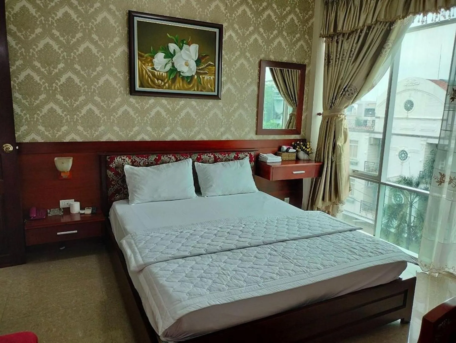 Photo of the whole room, Bed in Tam Tin Hotel