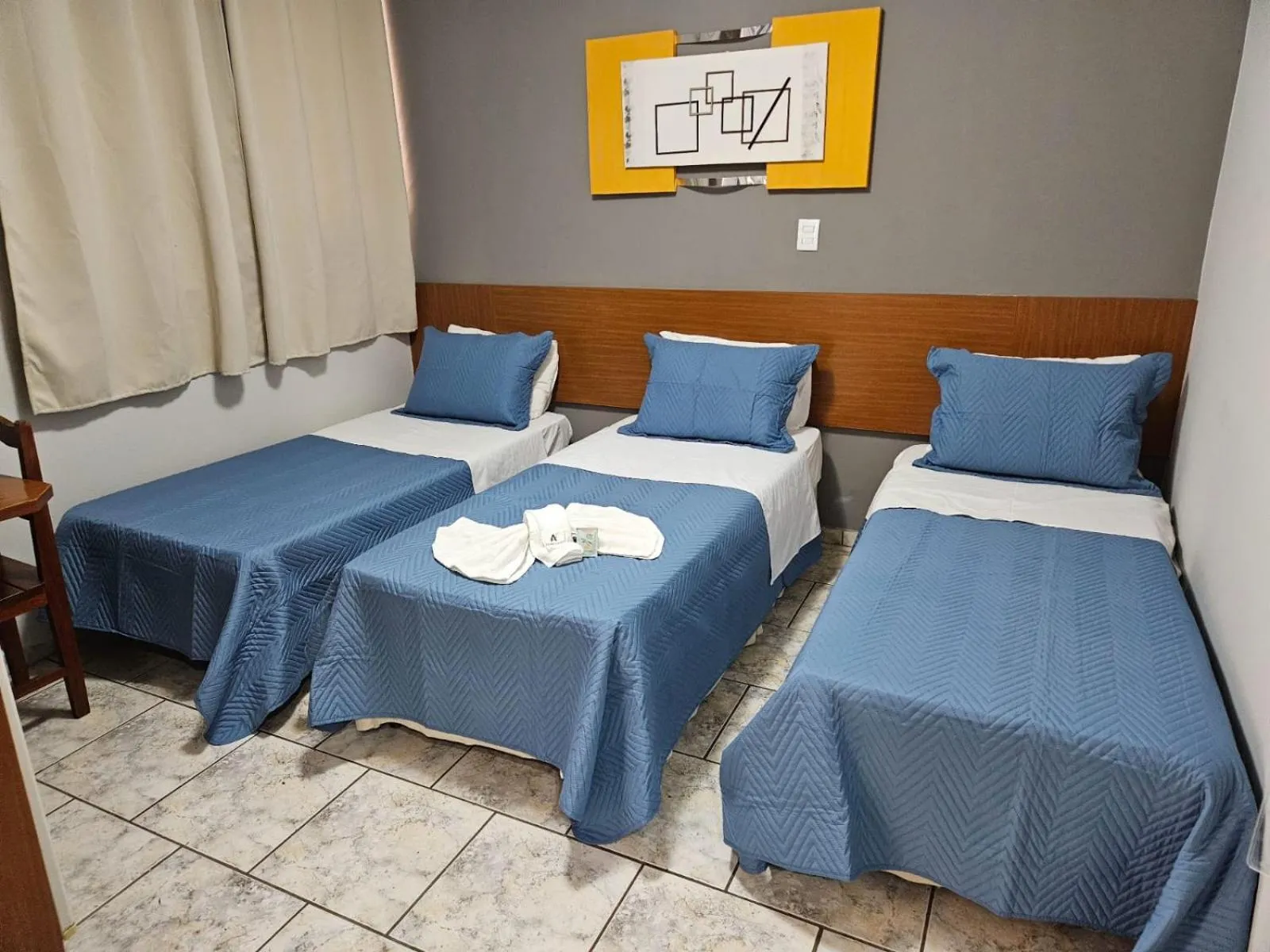 Bed in Alliance Hotel