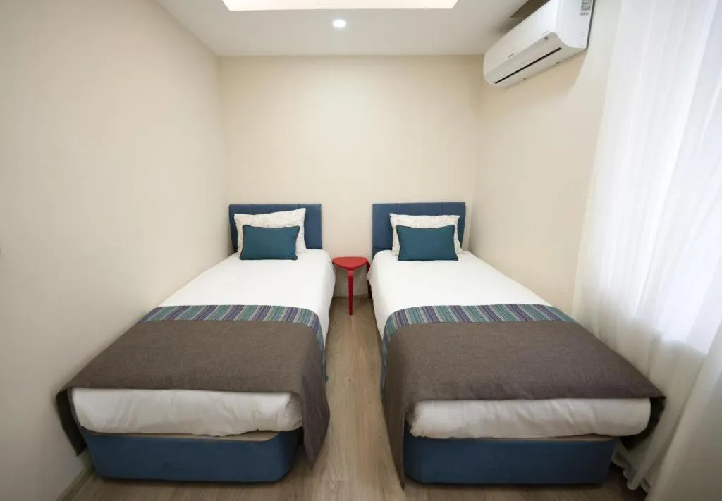 Bed in ABC Apart Hotel