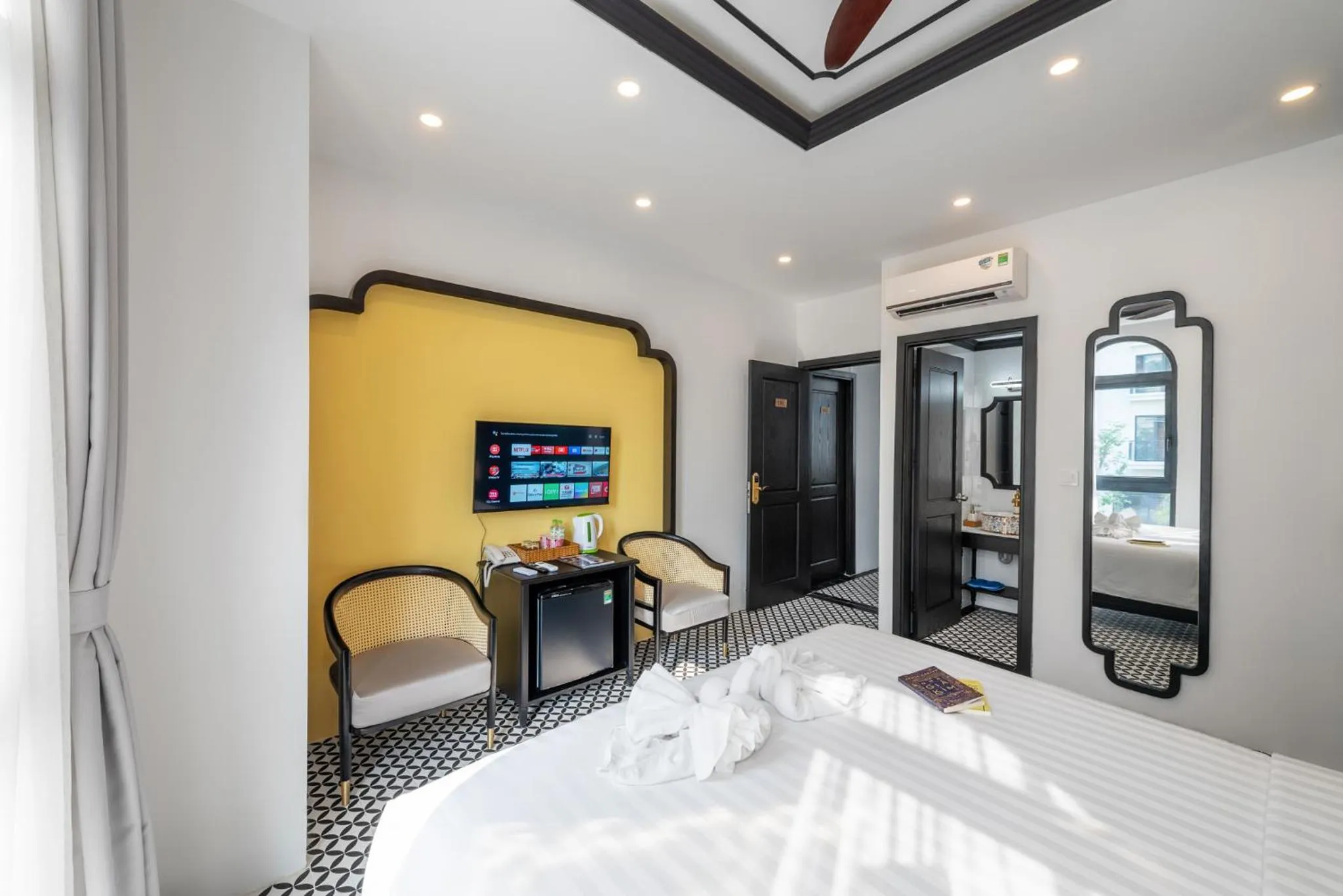 Photo of the whole room, Bed in Le Palmier Phu Quoc Hotel - Free Shuttle To Grand World