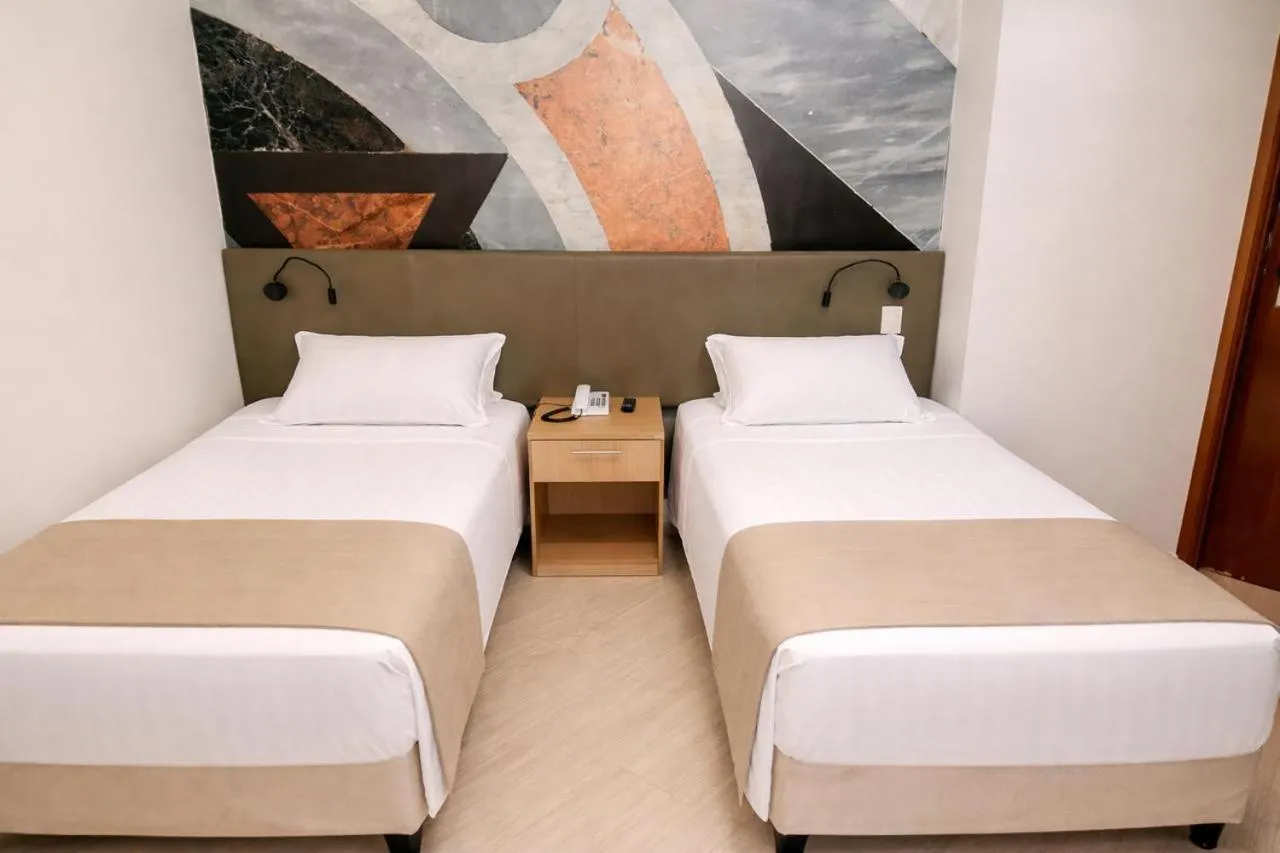 Photo of the whole room, Bed in Cosmopolitan Praia Flat
