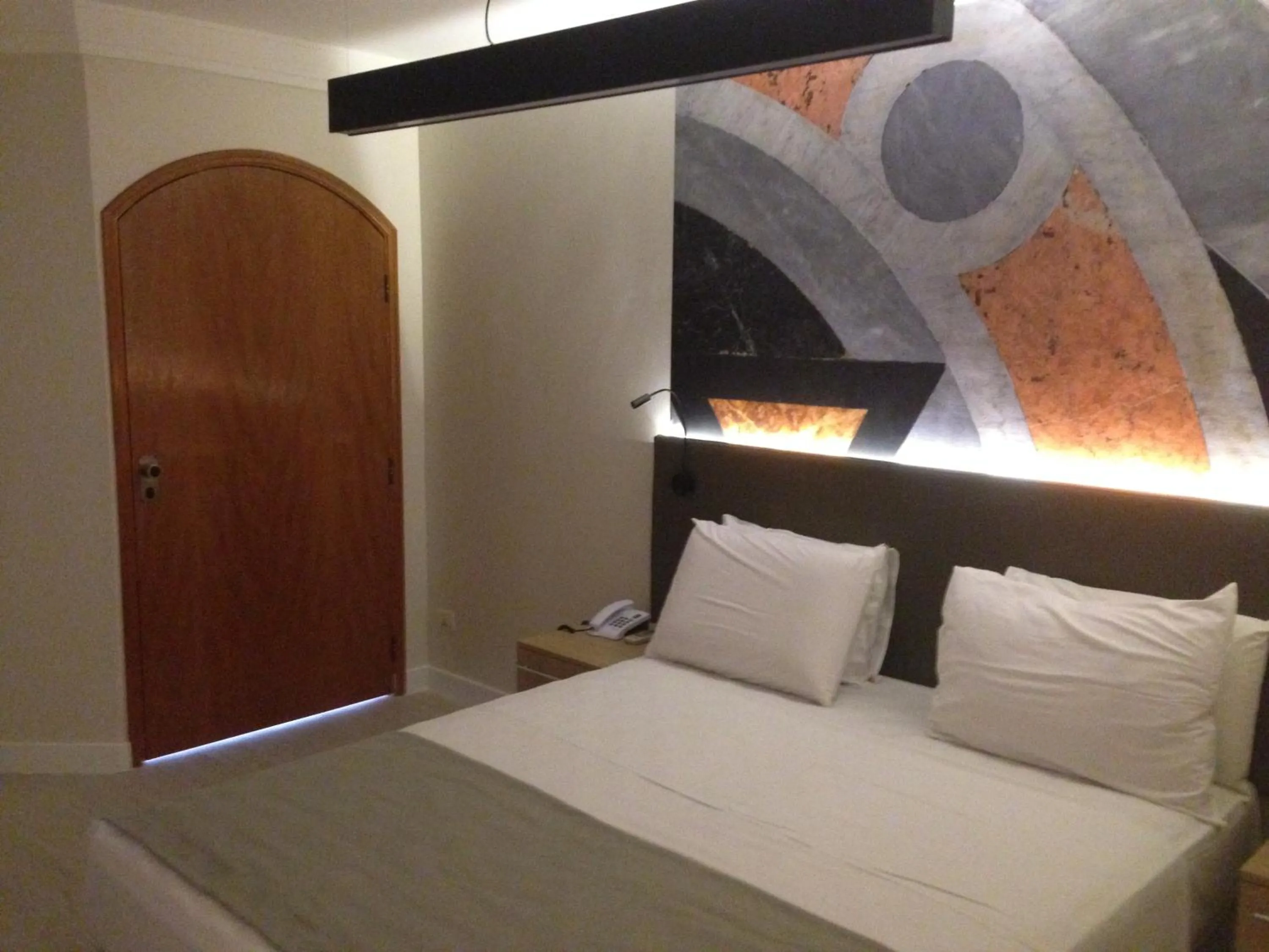 Bed in Cosmopolitan Praia Flat