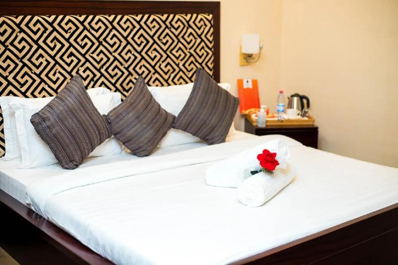 Bed in Hôtel Guest House Quatre Saisons