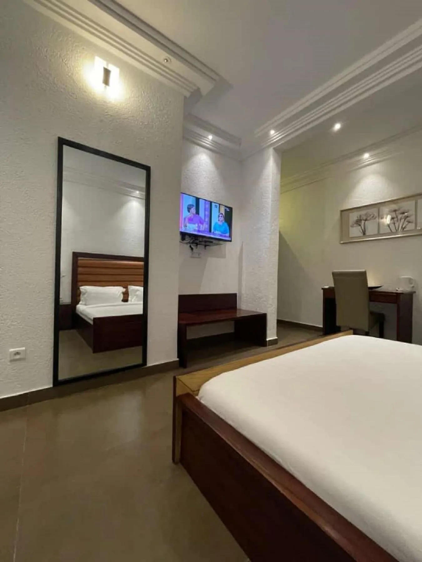 Bed in Hôtel Guest House Quatre Saisons