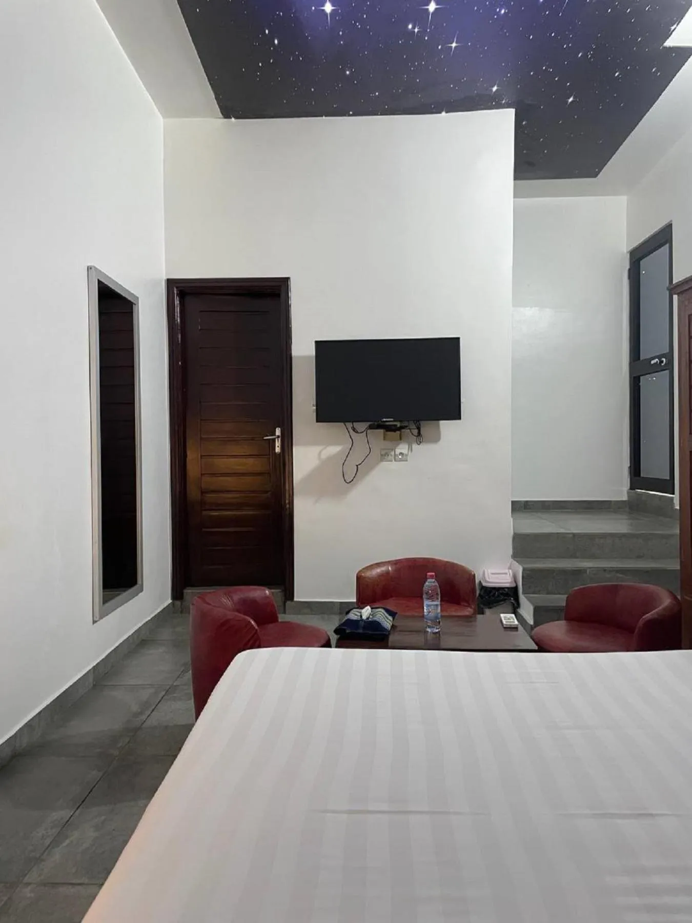 Bed in Hôtel Guest House Quatre Saisons