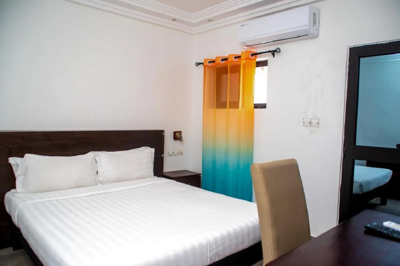 Bed in Hôtel Guest House Quatre Saisons