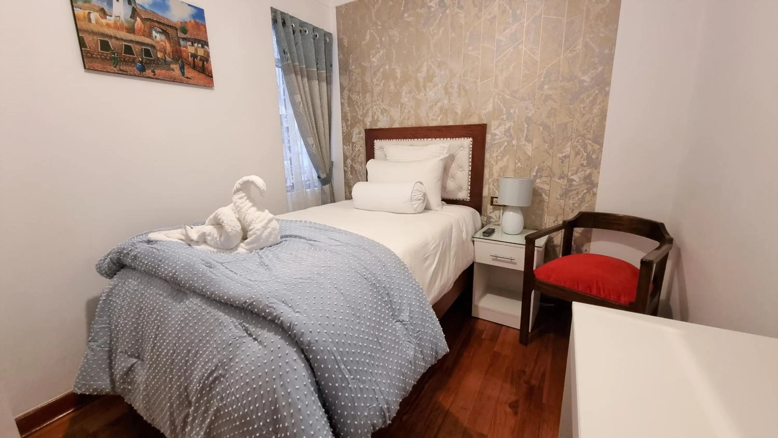 Bed in Hotel-Apartment INKASABIOS