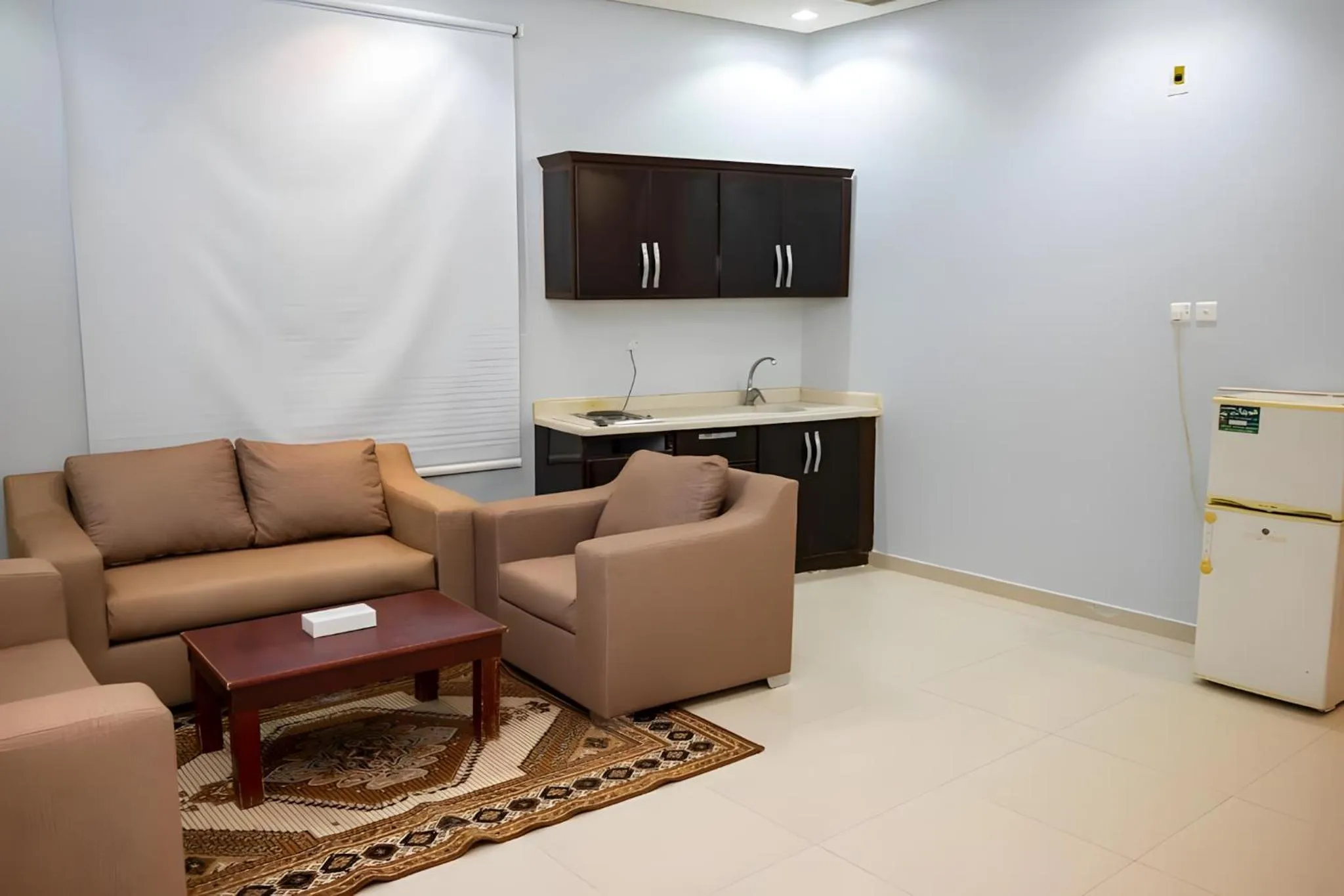 Communal lounge/ TV room in شقق اهلين اربعة للشقق المخدومة