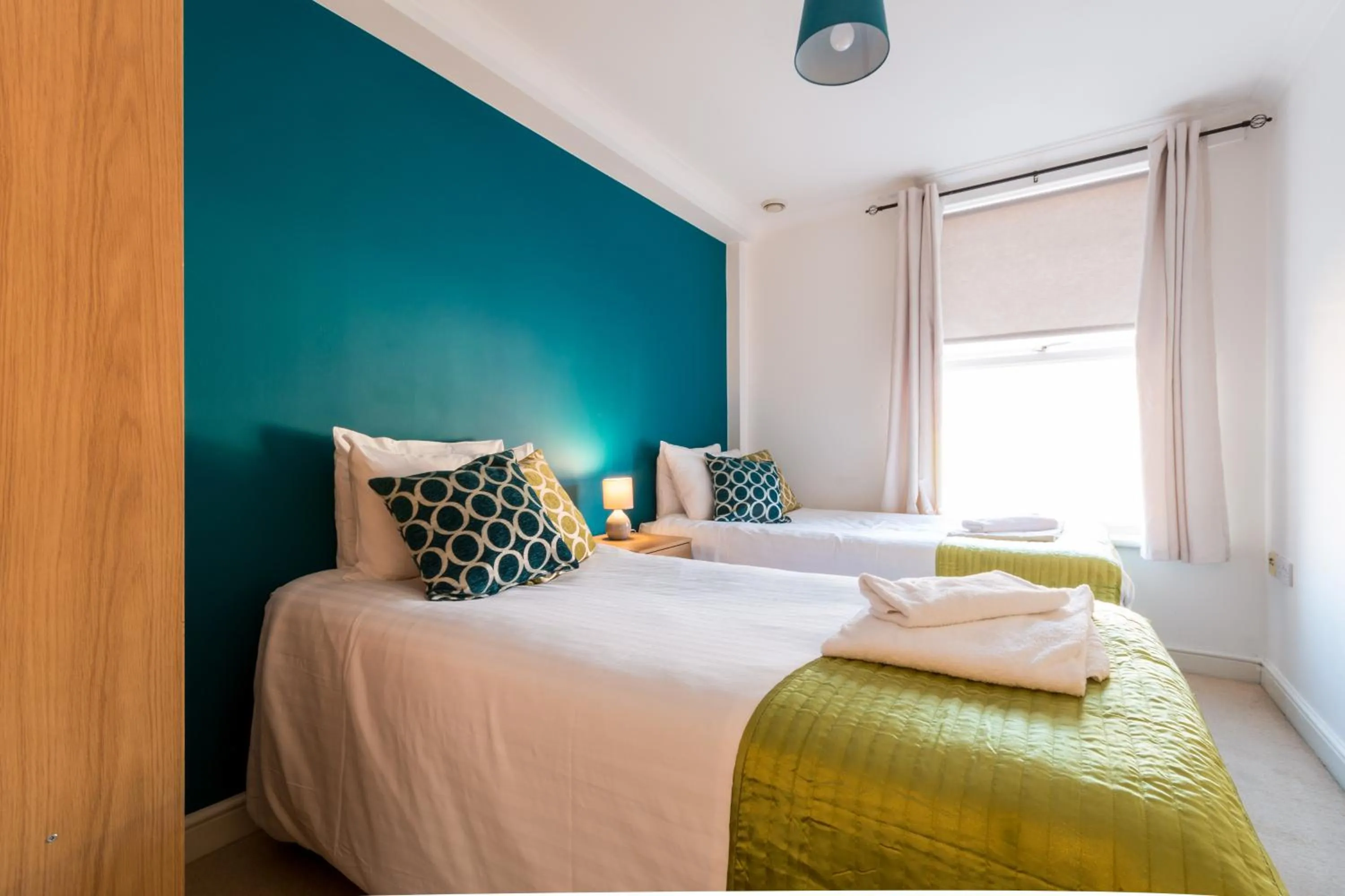 Bed in Old Town Apartments