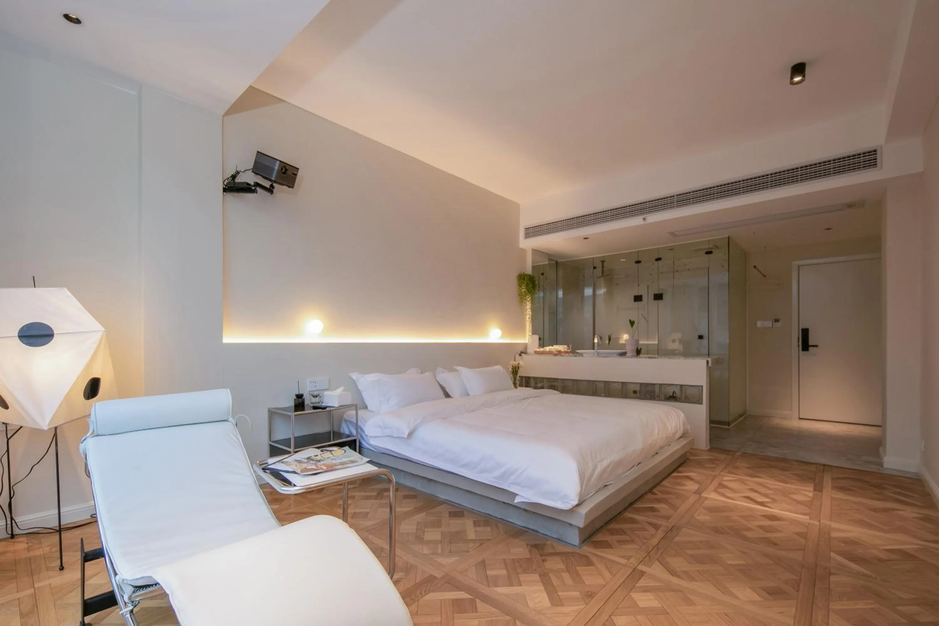 Bed in IM Waiting Hotel