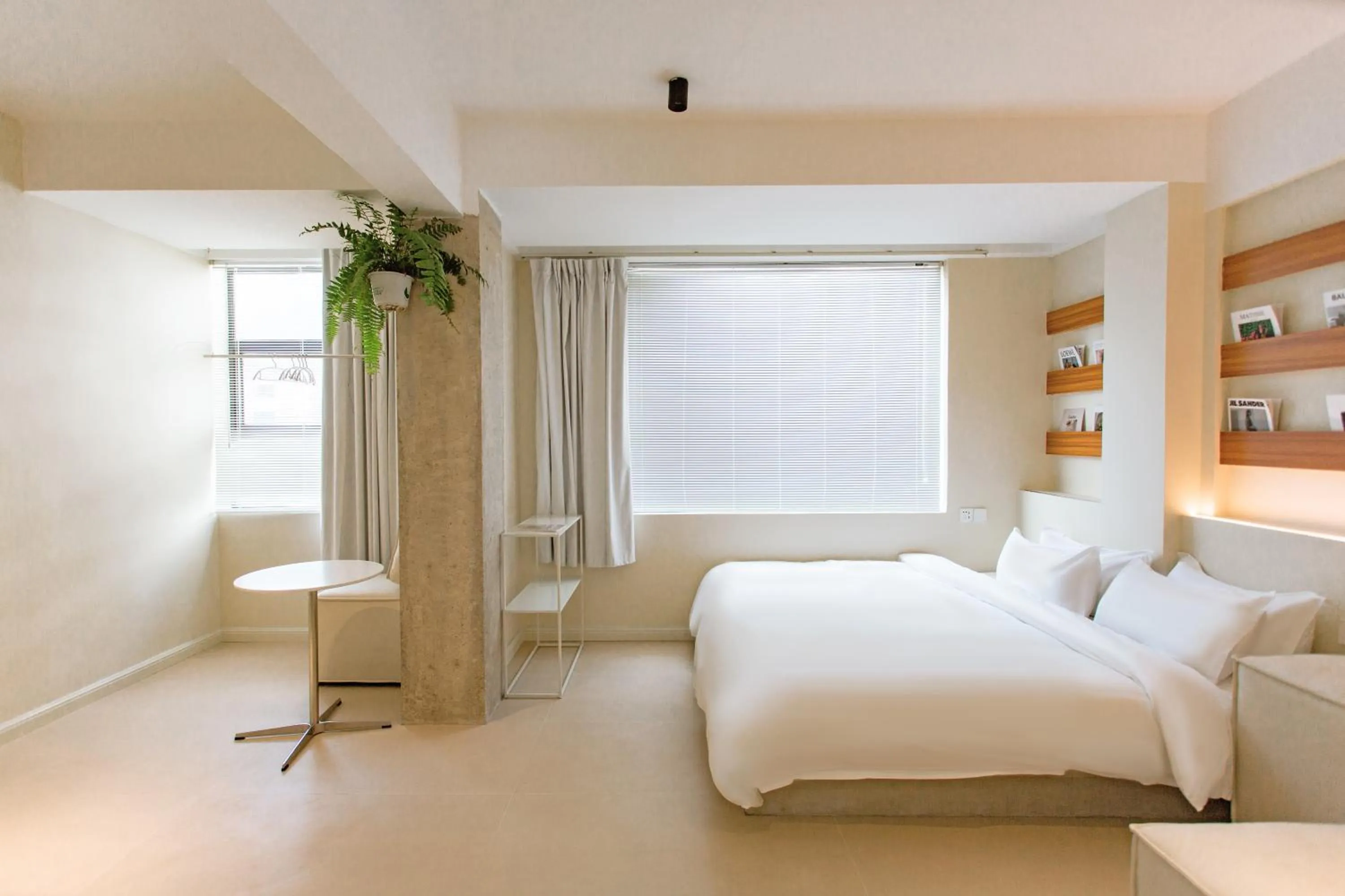 Bed in IM Waiting Hotel