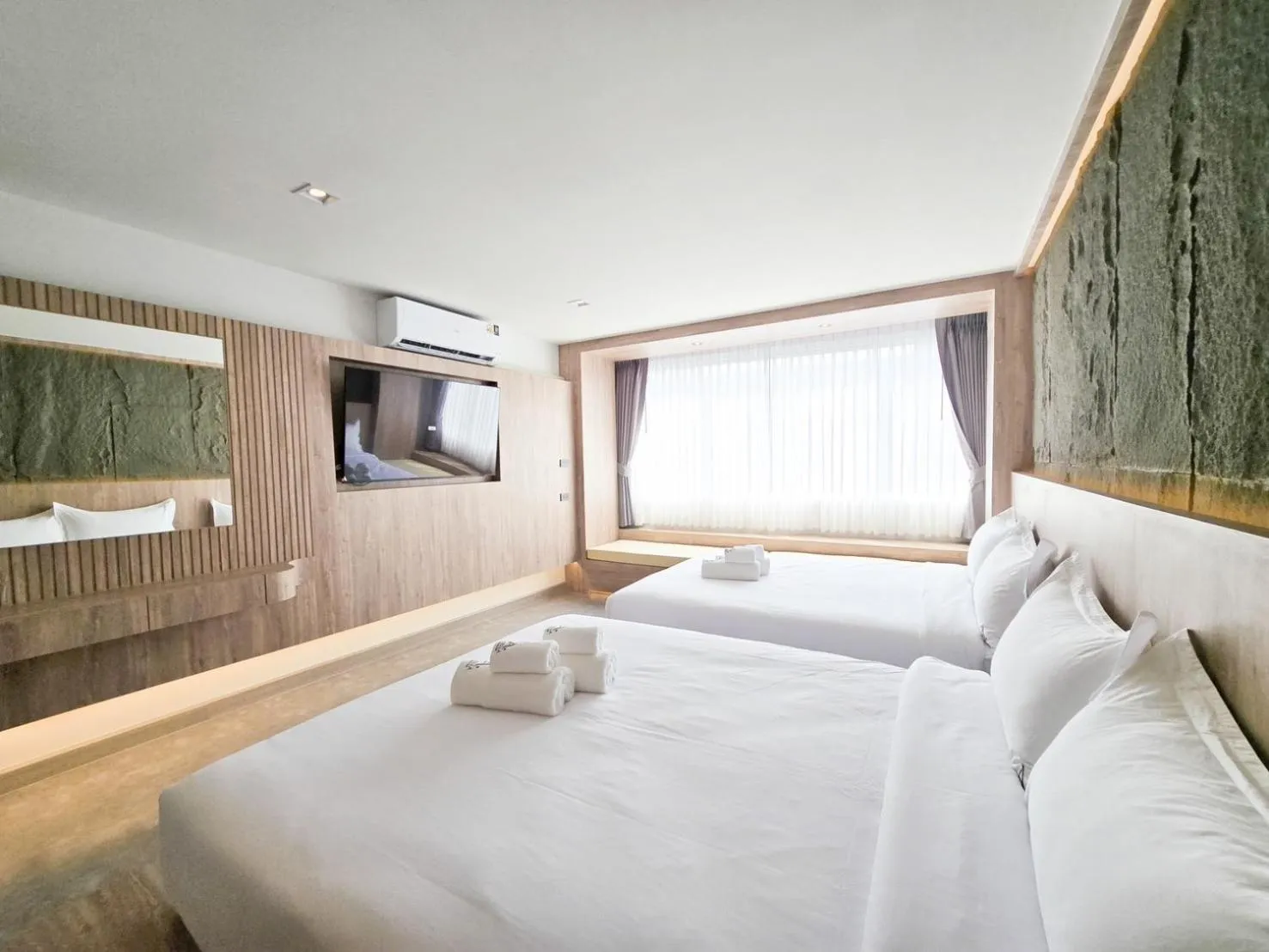 Bed in Ascella Bangkok Hotel