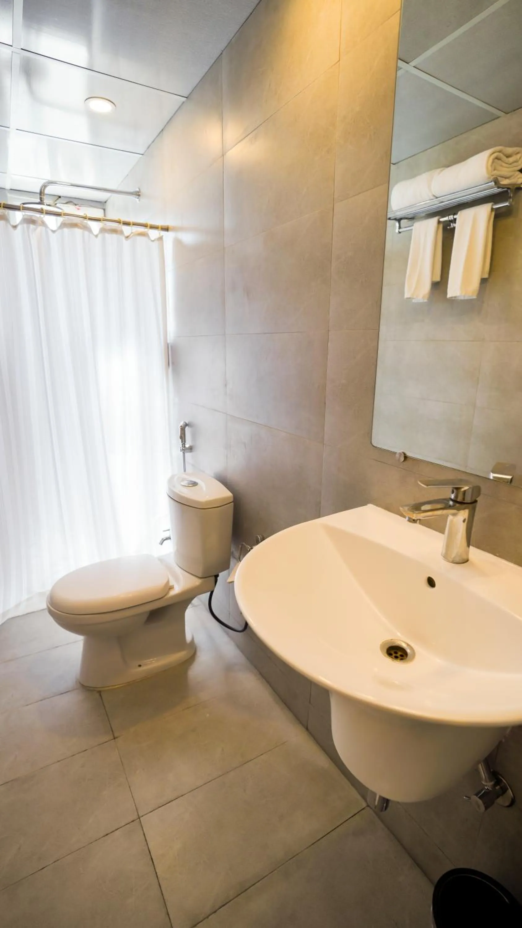 Bathroom in Bloom Hotel - Magarpatta